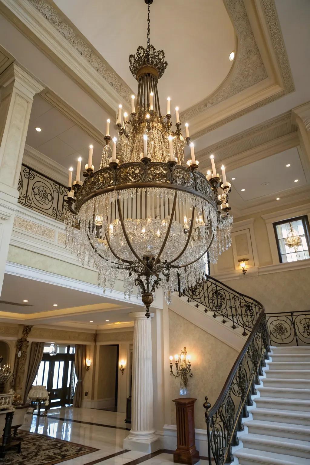 A statement chandelier introduces elegance to a double-height entryway.