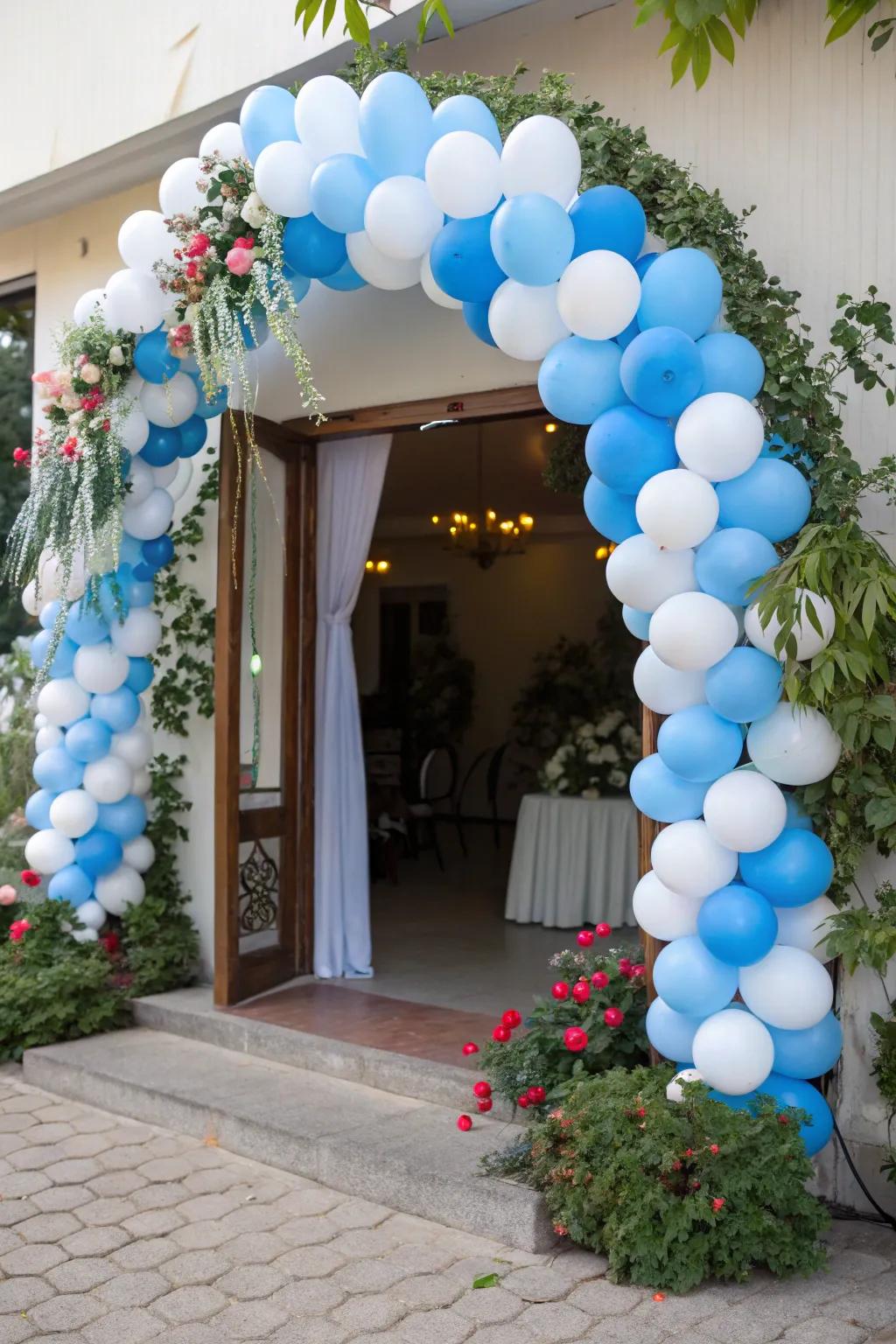 A lovely blue and white balloon arch cheerfully welcomes everyone to your event.