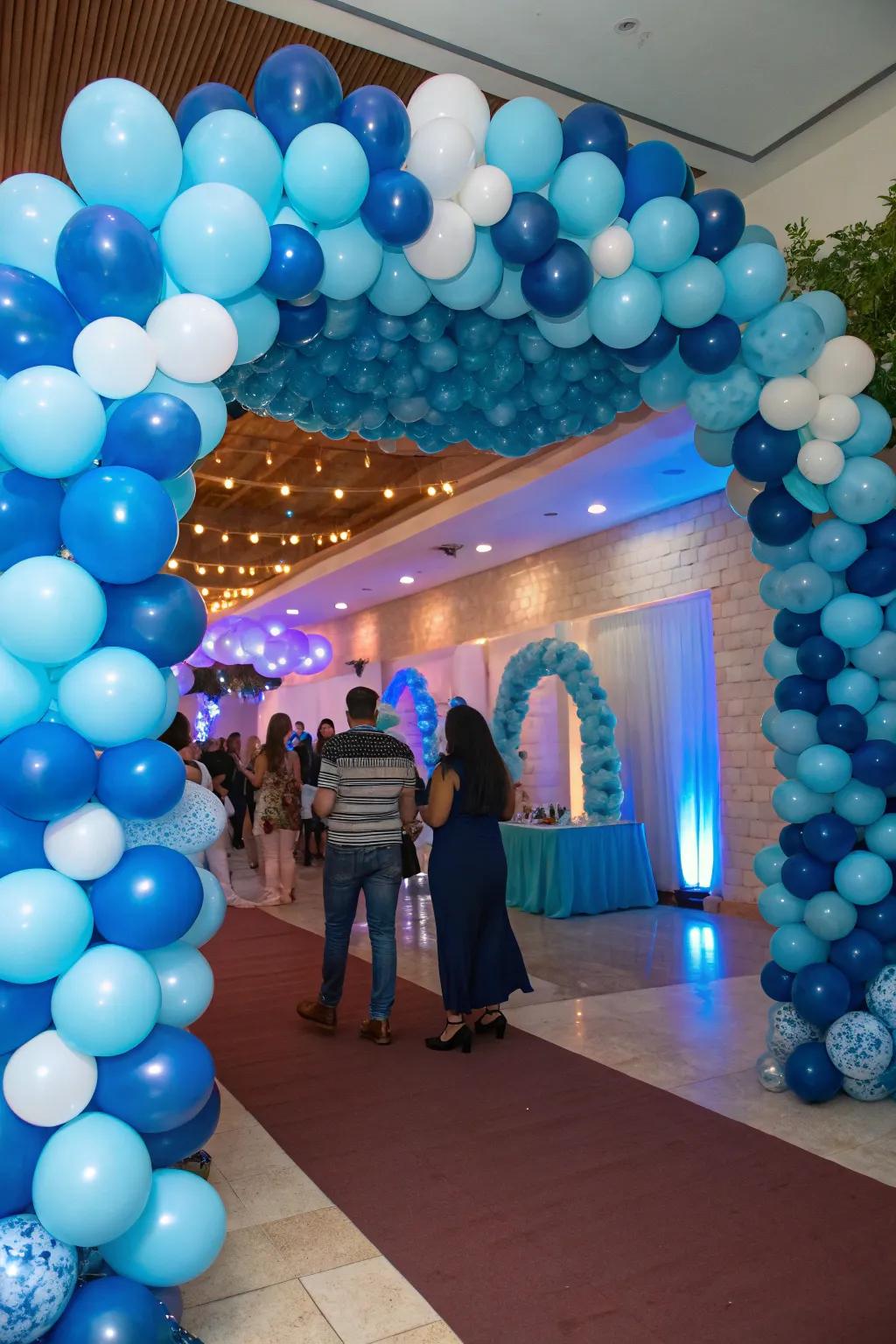 An impressive blue balloon arch sets a playful and magical mood for the party.