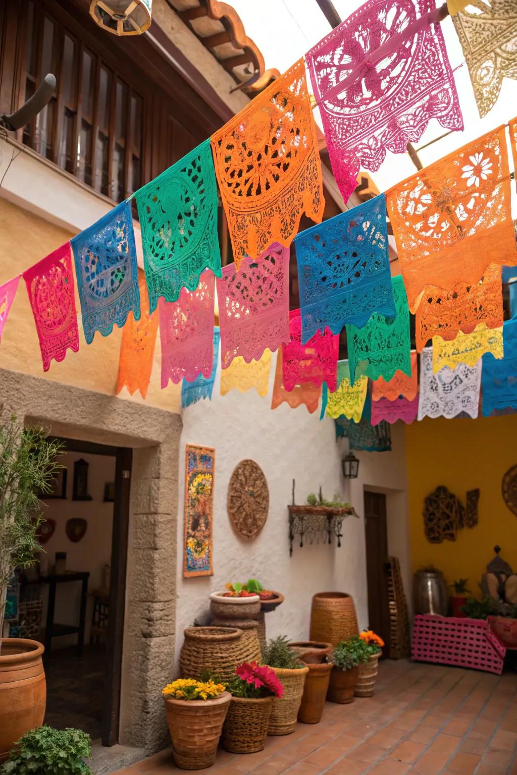 Bright papel picado streamers bring a cheerful vibe to any Cinco de Mayo gathering.