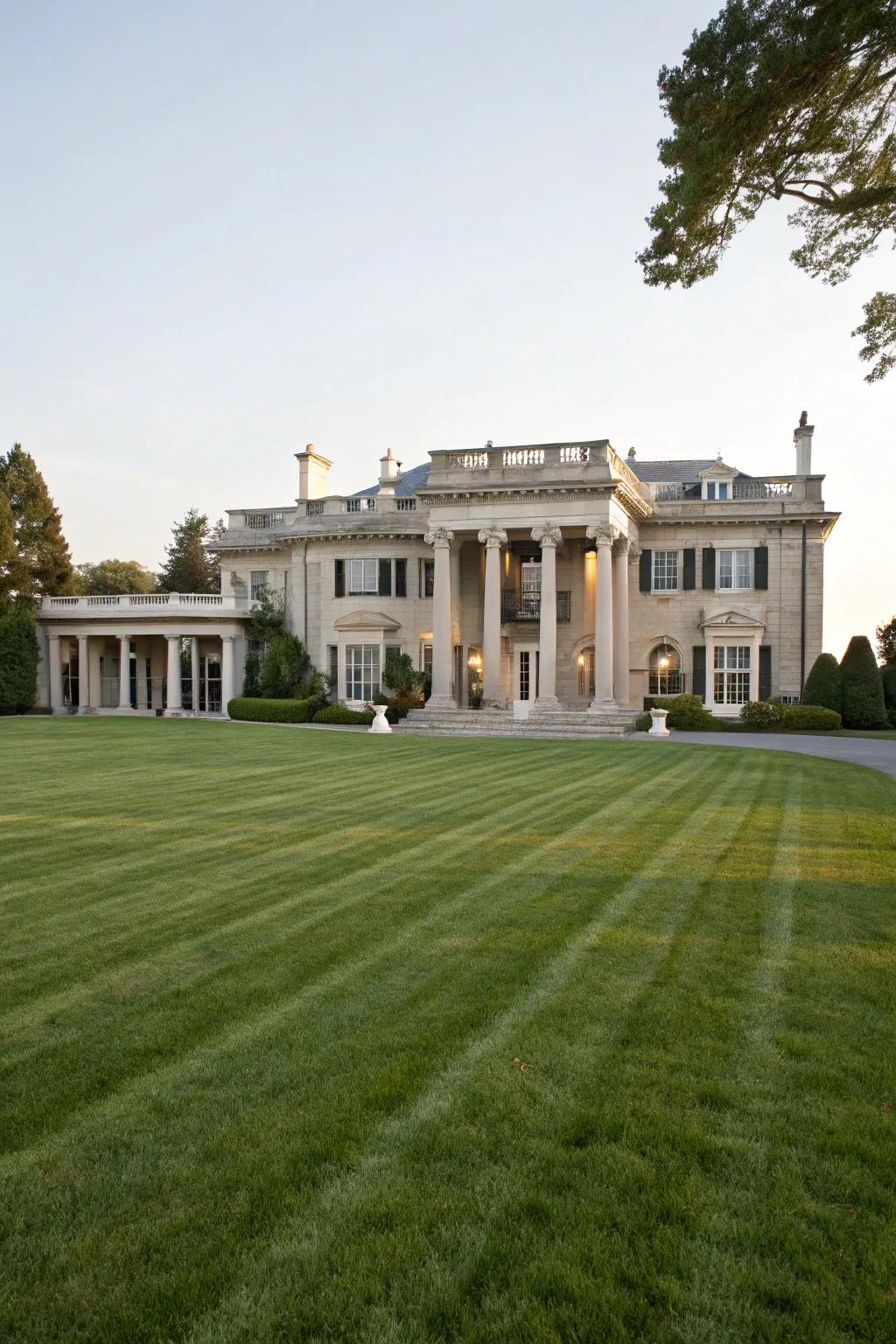 A breathtaking home presenting a sophisticated facade and expansive yard.