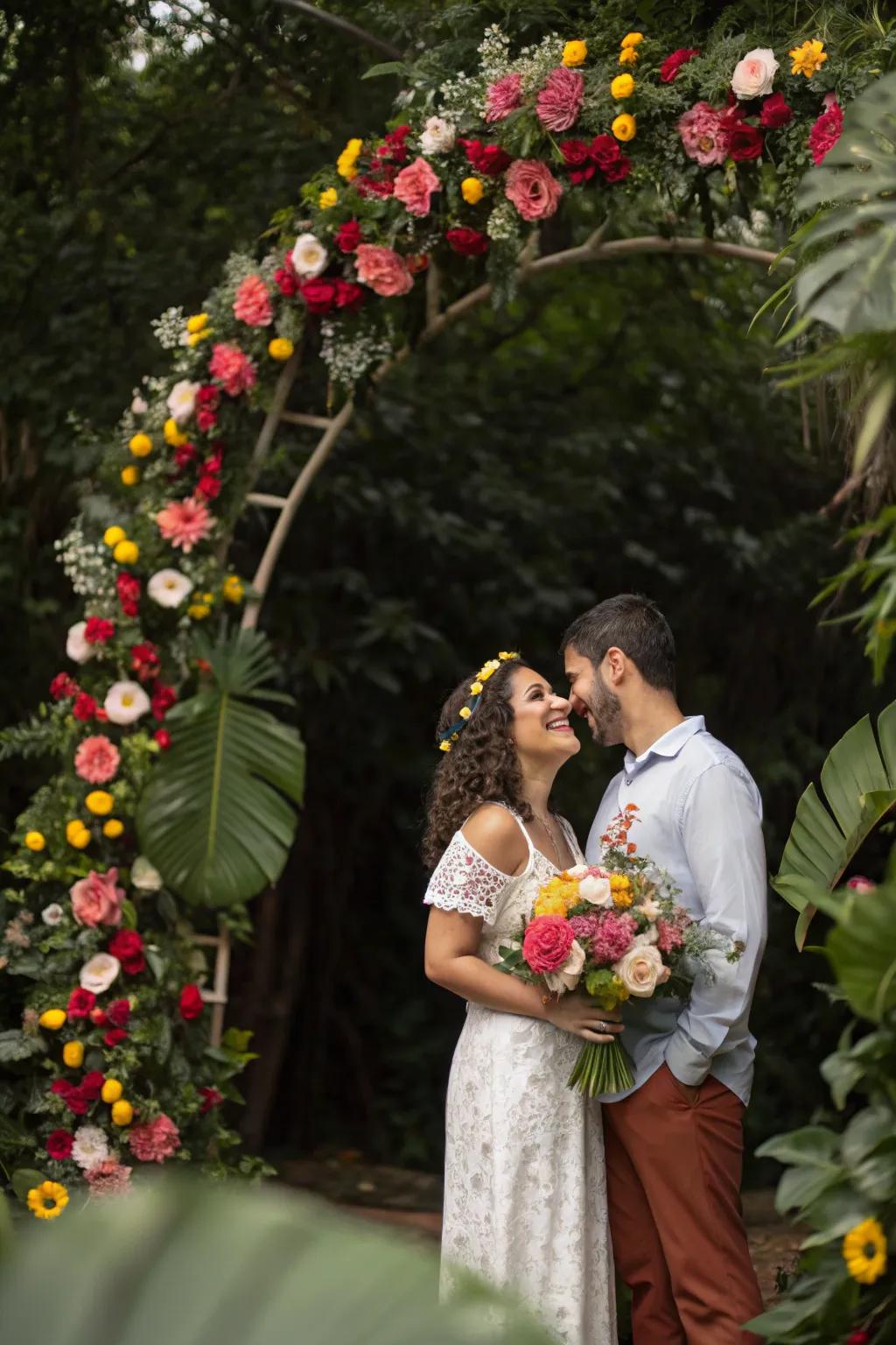 A vibrant floral arch creates a stunning backdrop for the engagement party.
