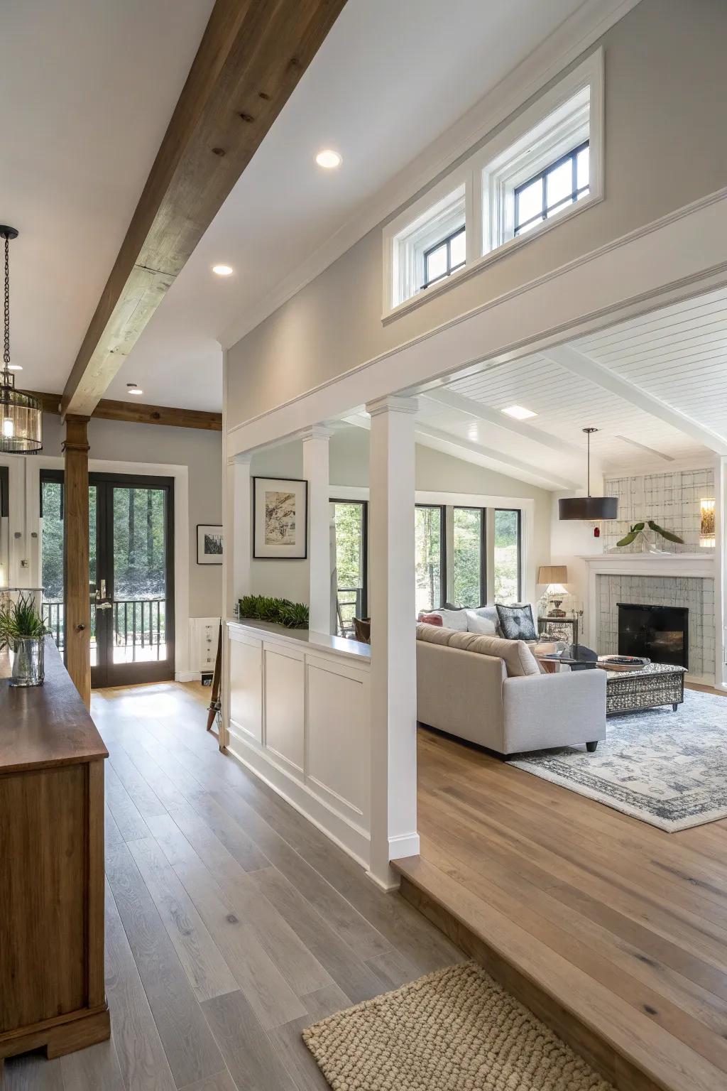An open floor plan featuring a half wall that subtly divides the space.