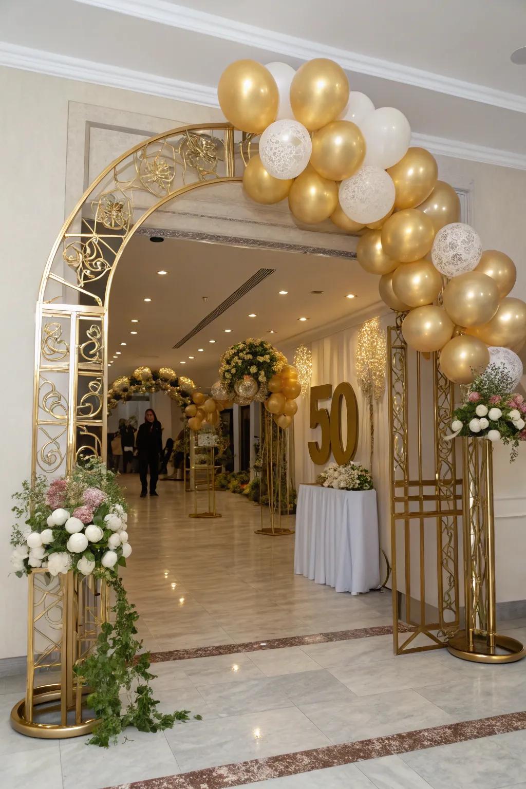 A magnificent gilded balloon gateway offers a grand welcome to all attendees.
