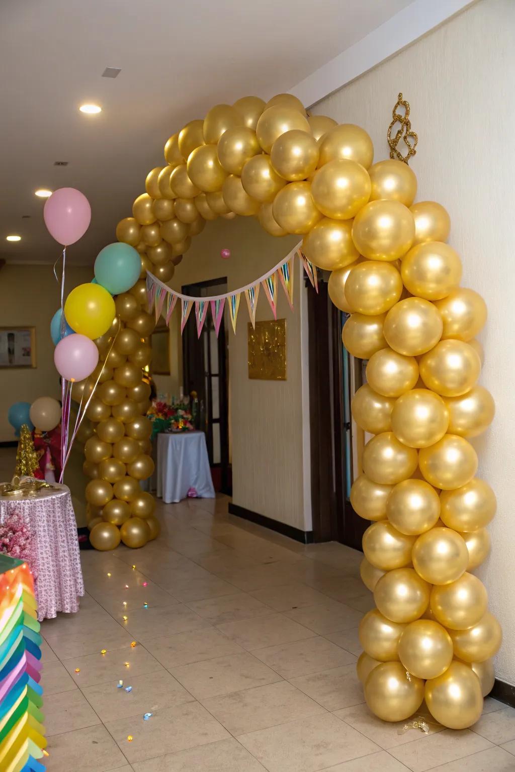 A show-stopping gold balloon arch for an impressive entrance.