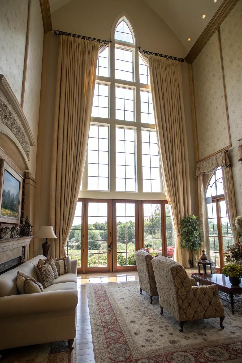 Lengthy curtains naturally guide the eye upwards, bestowing a sense of sophistication to rooms blessed with high ceilings.