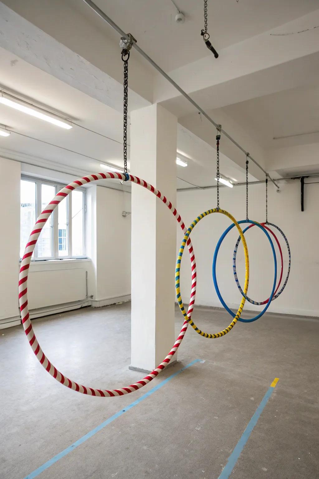 Hula hoops gracefully hanging from ceiling hooks, serving as both a practical and artistic display.