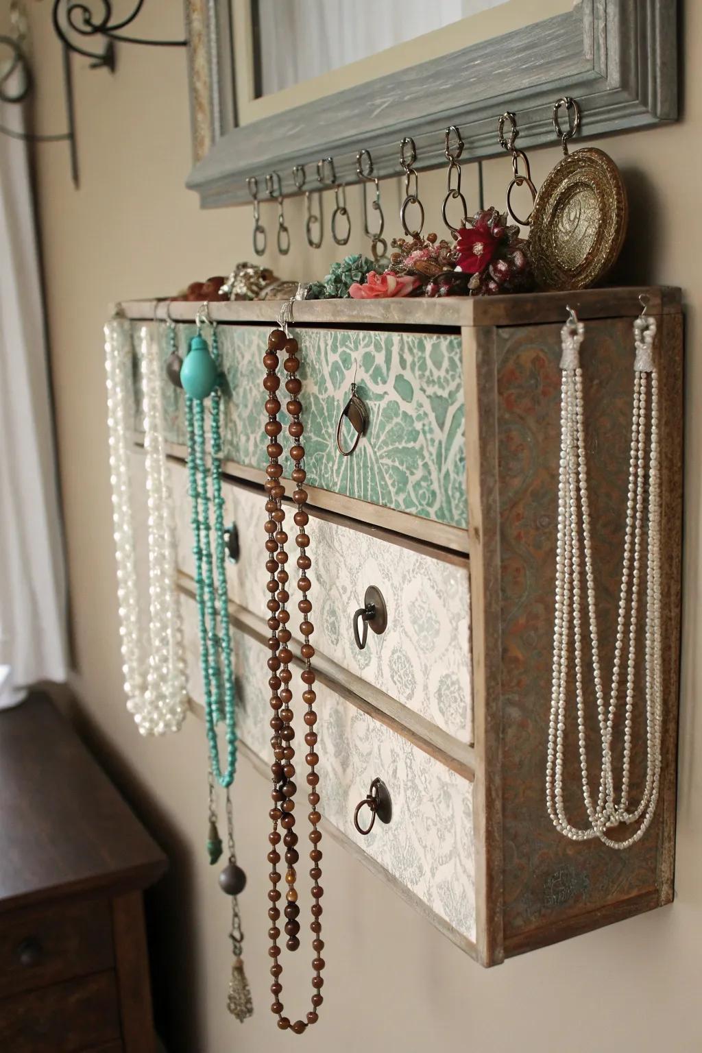 A vintage chest transformed into an elegant necklace arrangement