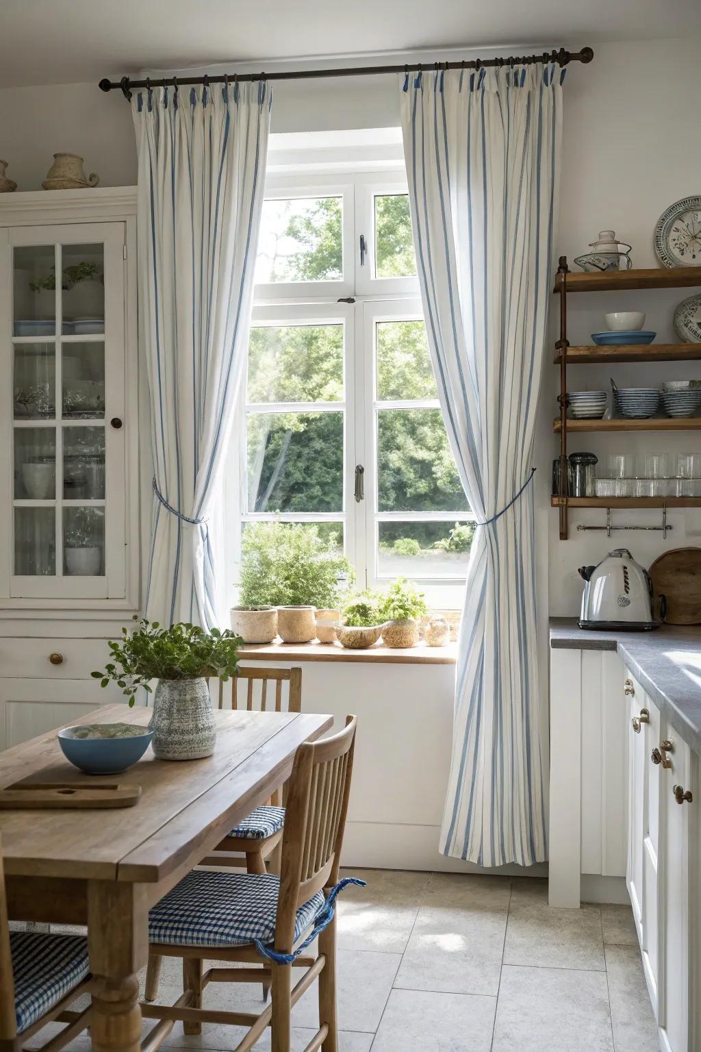 Classic striped window coverings lend a dash of refinement to this kitchen space.
