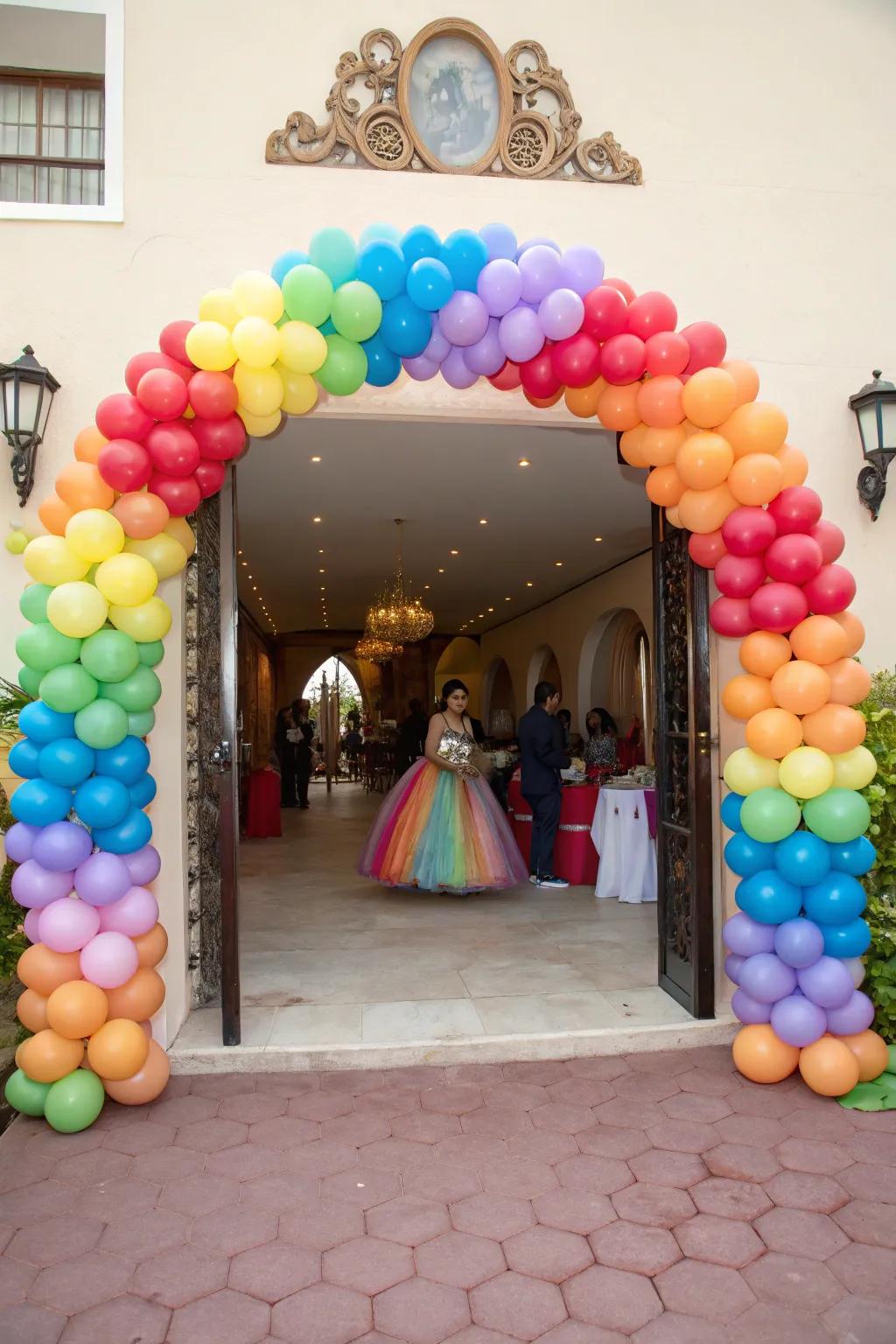 A stunning balloon arch extends a warm welcome to the quinceanera guests.