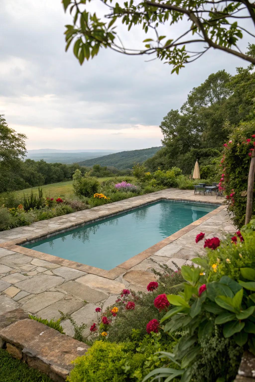 A patio of natural stone beautifully complements the rectangular pool.