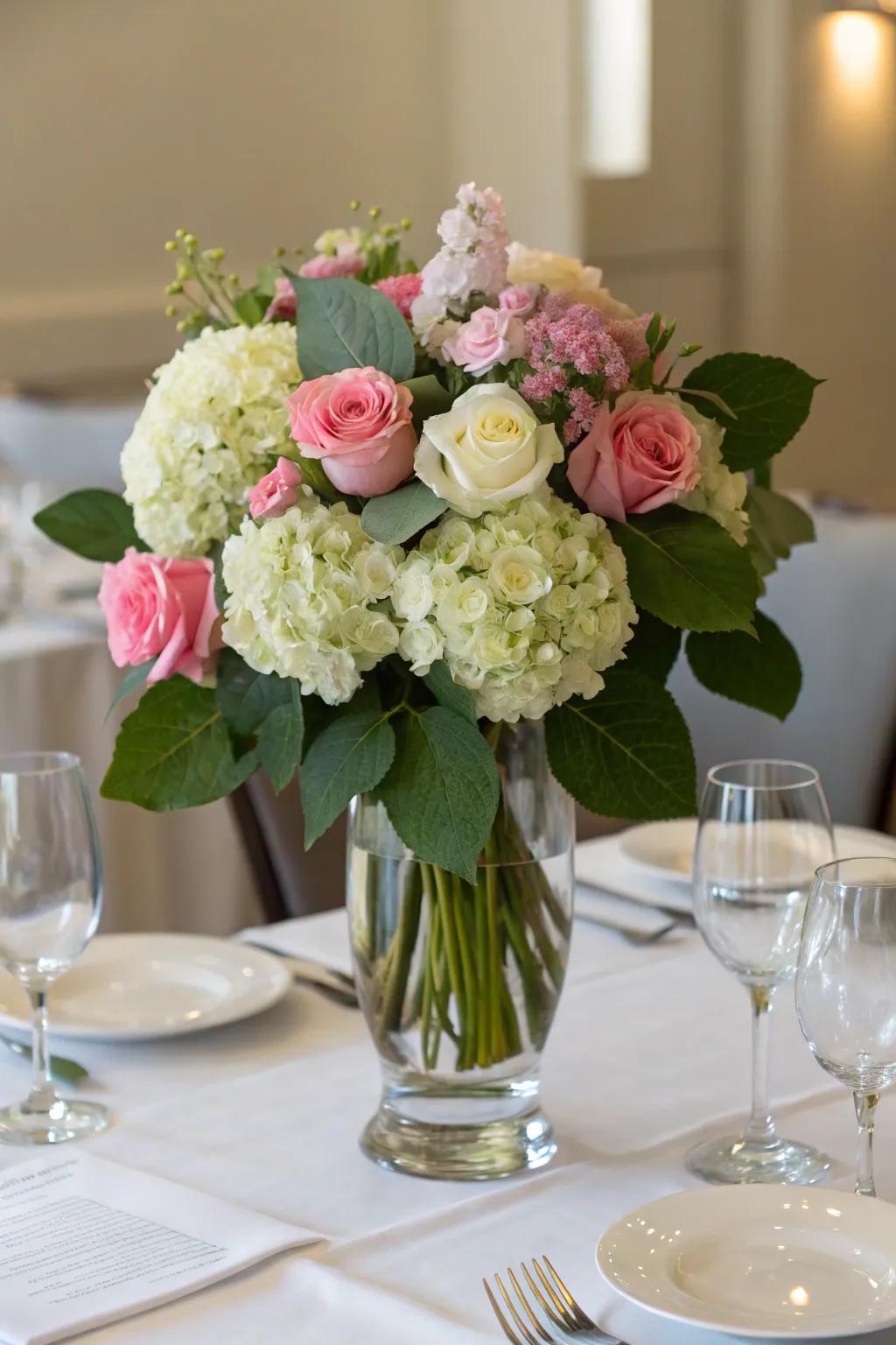 Refined blossom displays featuring tea roses and snowdrops.