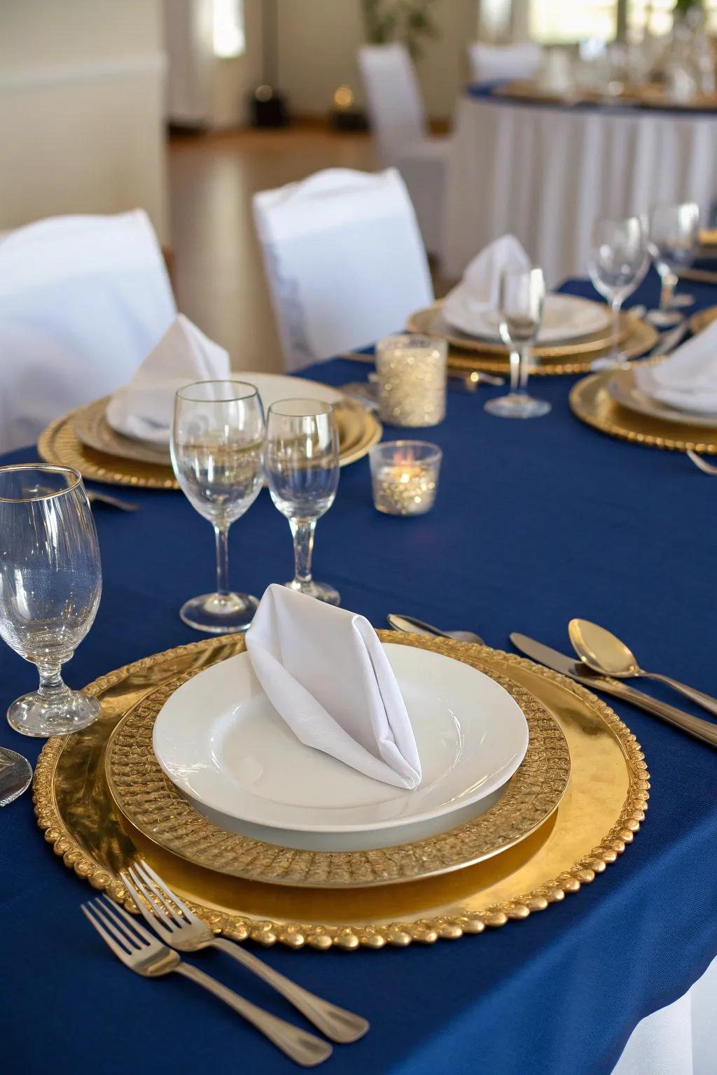 A lavish table arrangement showcasing royal blue and gold details.