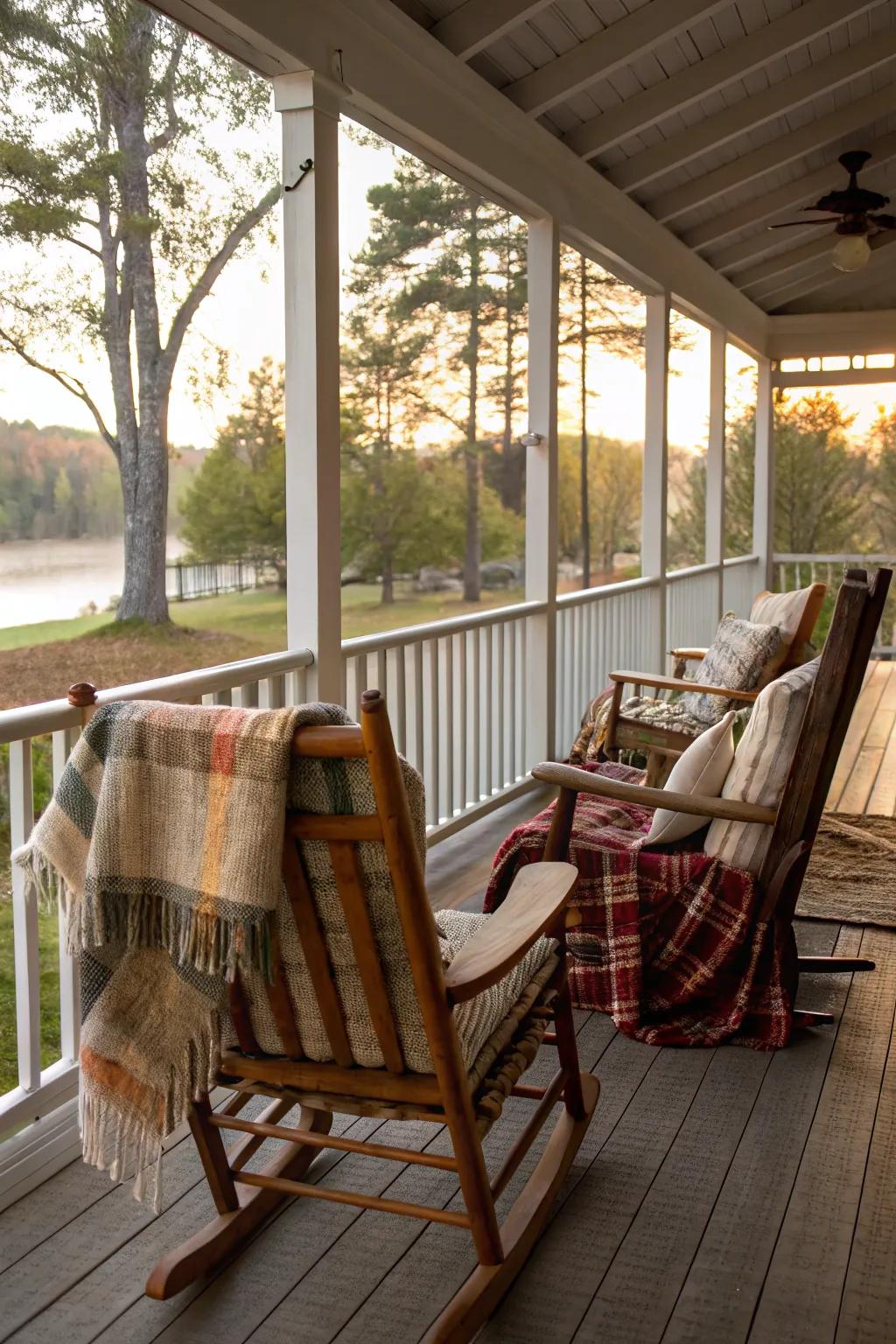 Timeless rocking chairs on a screened-in porch give a classic, welcoming vibe.