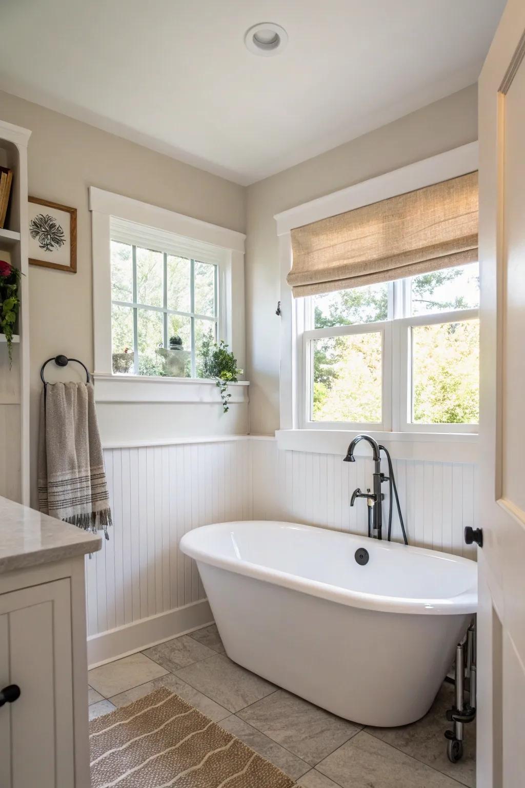 A small stand-alone tub brings a sense of luxury to a limited space.