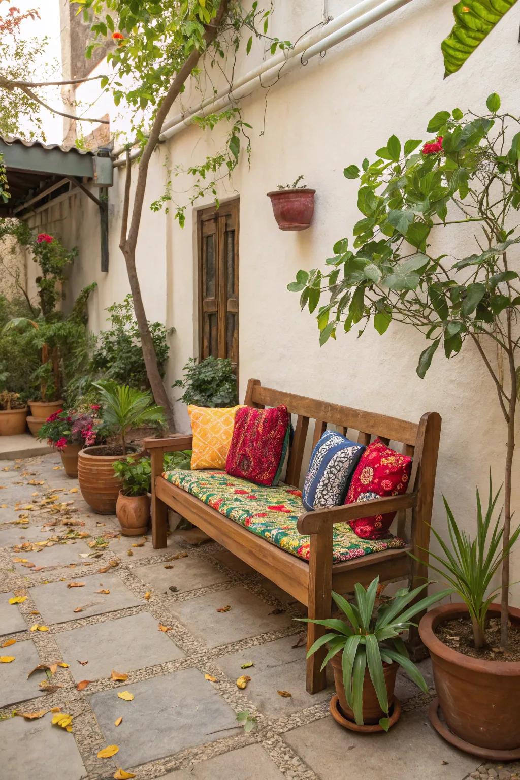 A refreshed bench featuring vibrant cushions creates an inviting sitting nook.