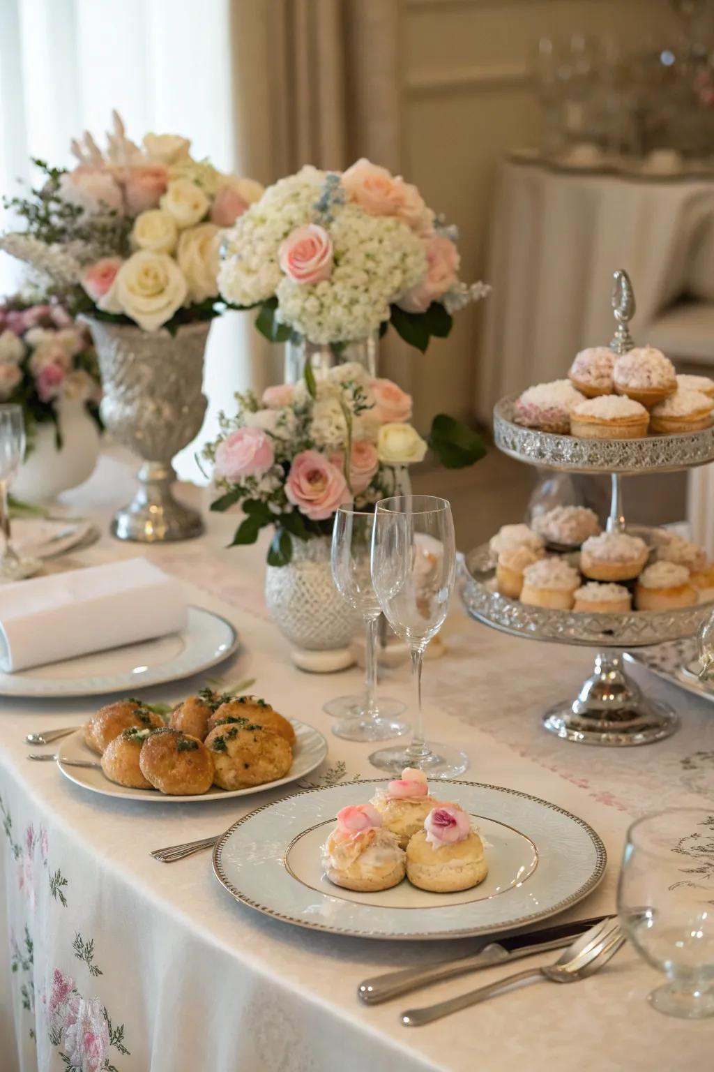 A beautifully designed table featuring fresh floral arrangements and a selection of tempting breakfast items.