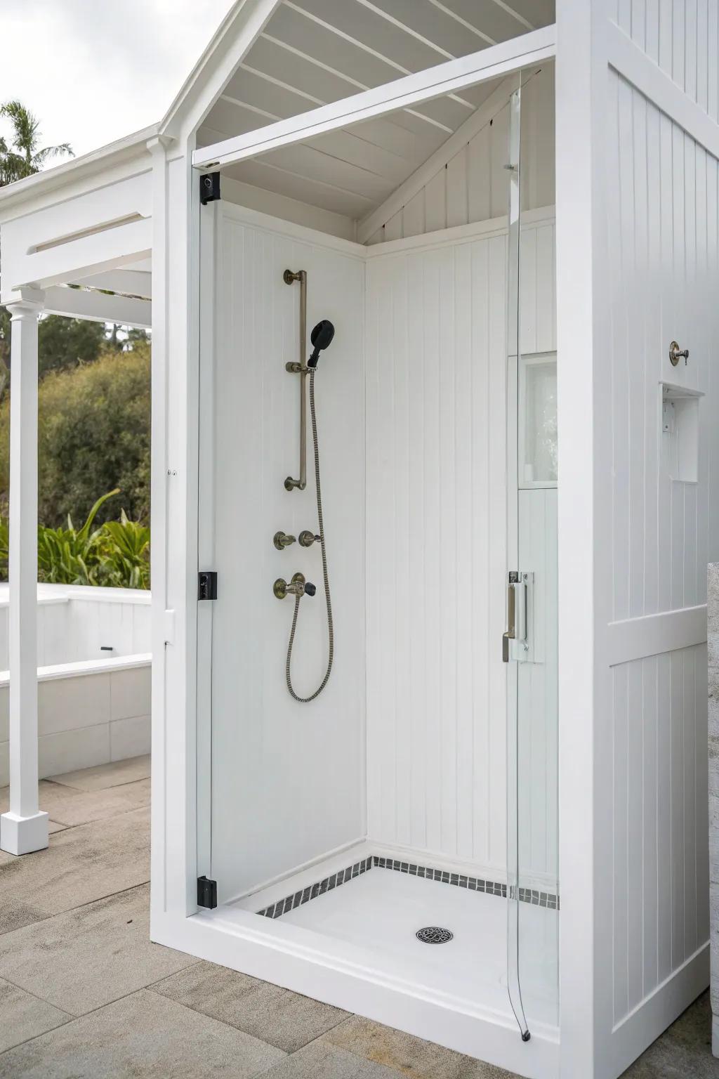 A minimalist white shower highlighting uncluttered lines and simplicity.