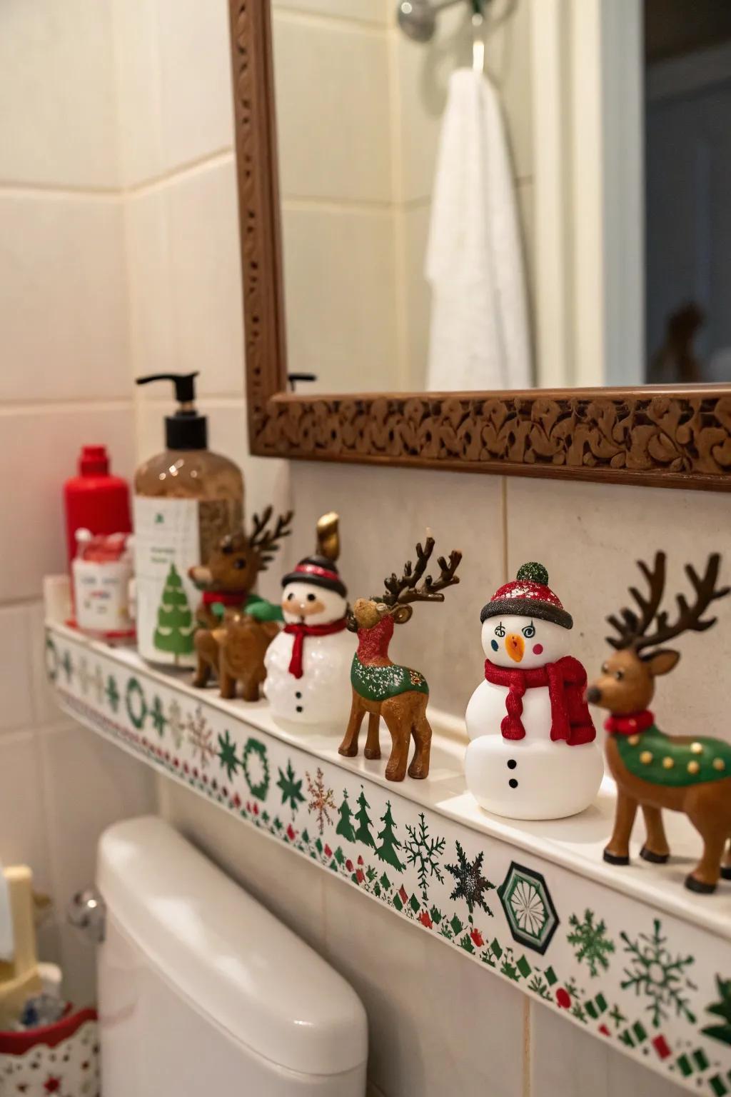 Yuletide statuettes introduce a whimsical touch to your bathroom decorations.