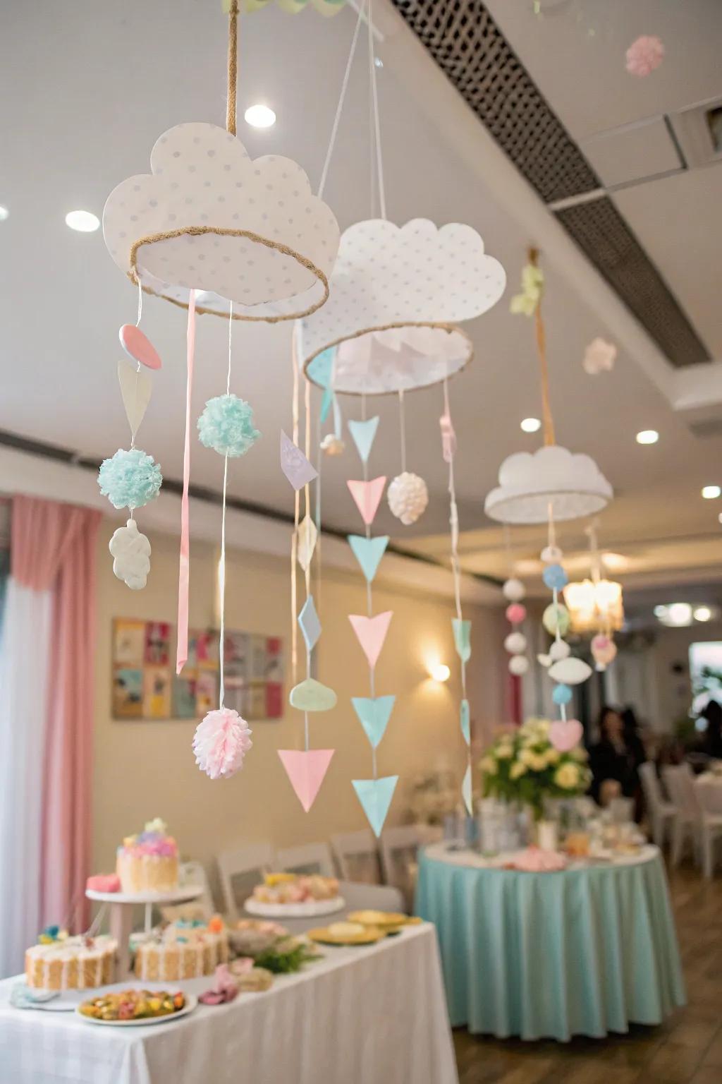 DIY cumulus mobiles usher in a handmade, whimsical accent to the baby shower décor.