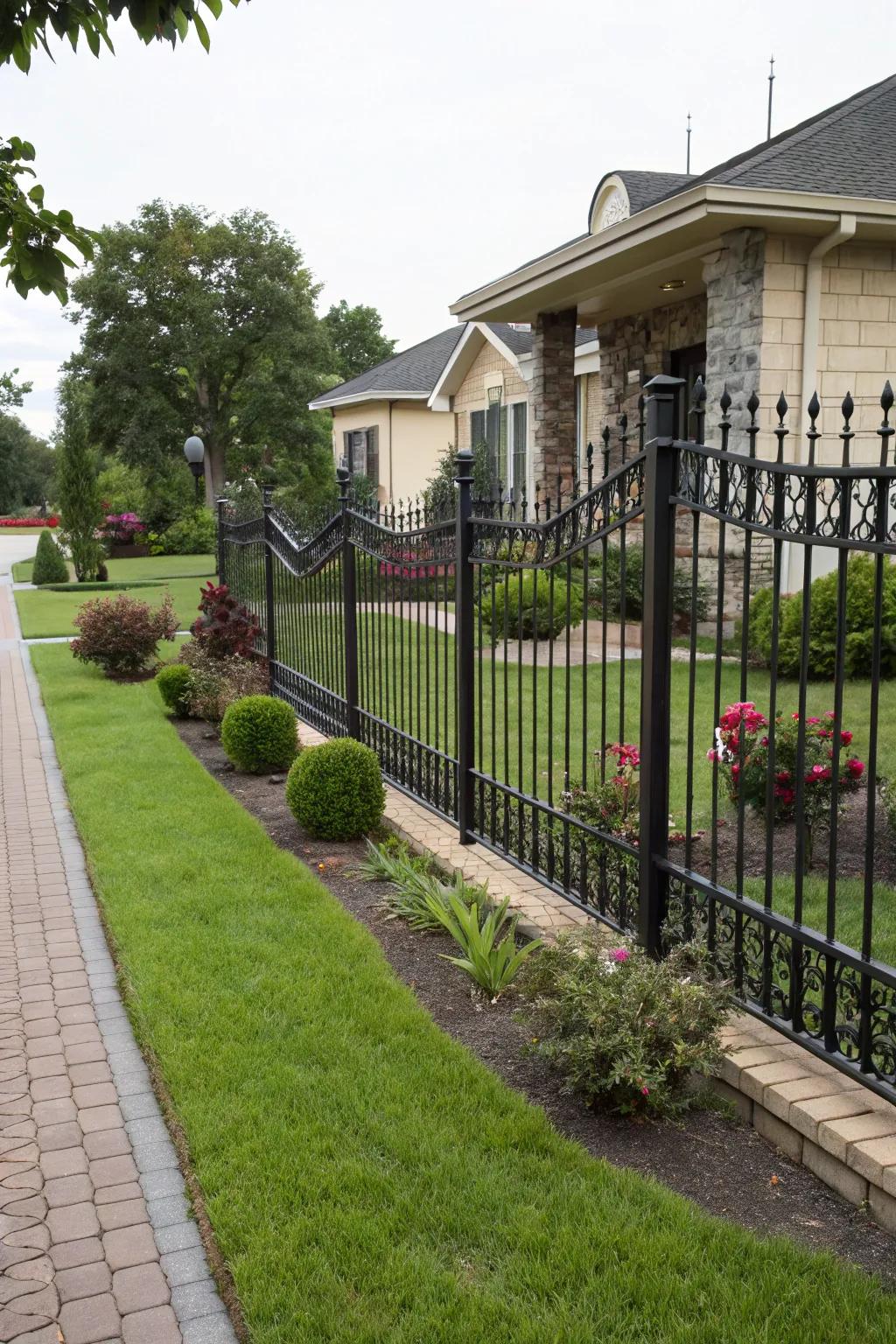 A closed decorative metal barrier ensuring privacy in a stylish front yard.