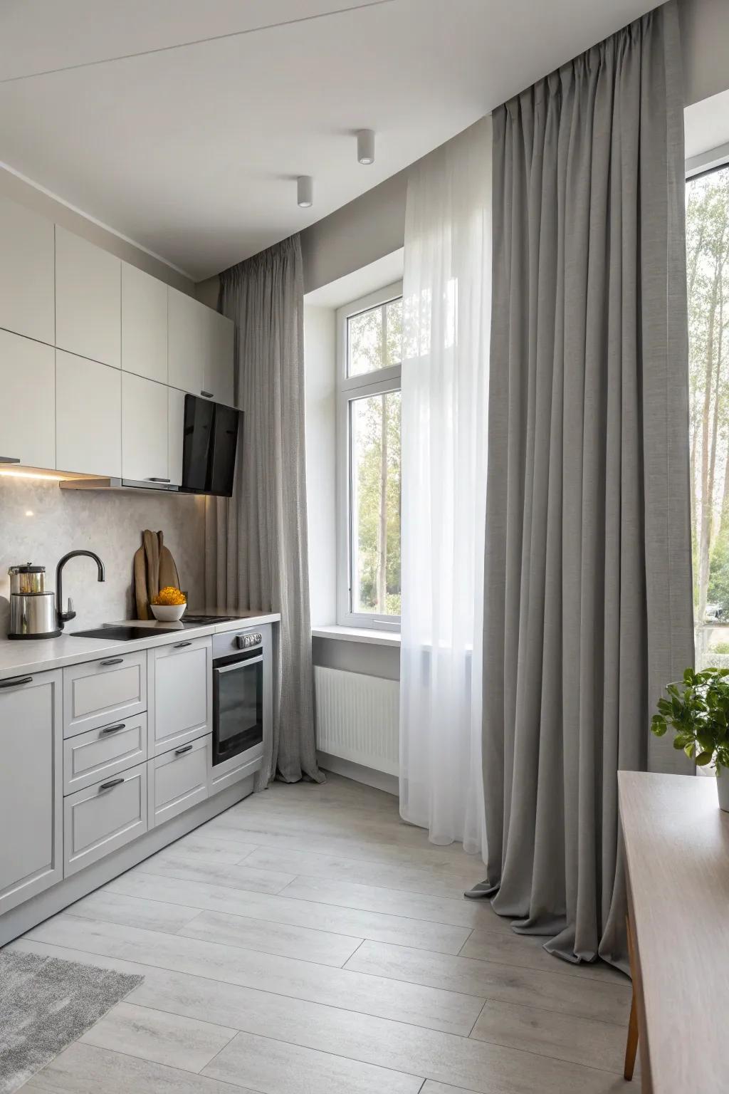 Minimalist gray drapes that merge seamlessly with kitchen design.