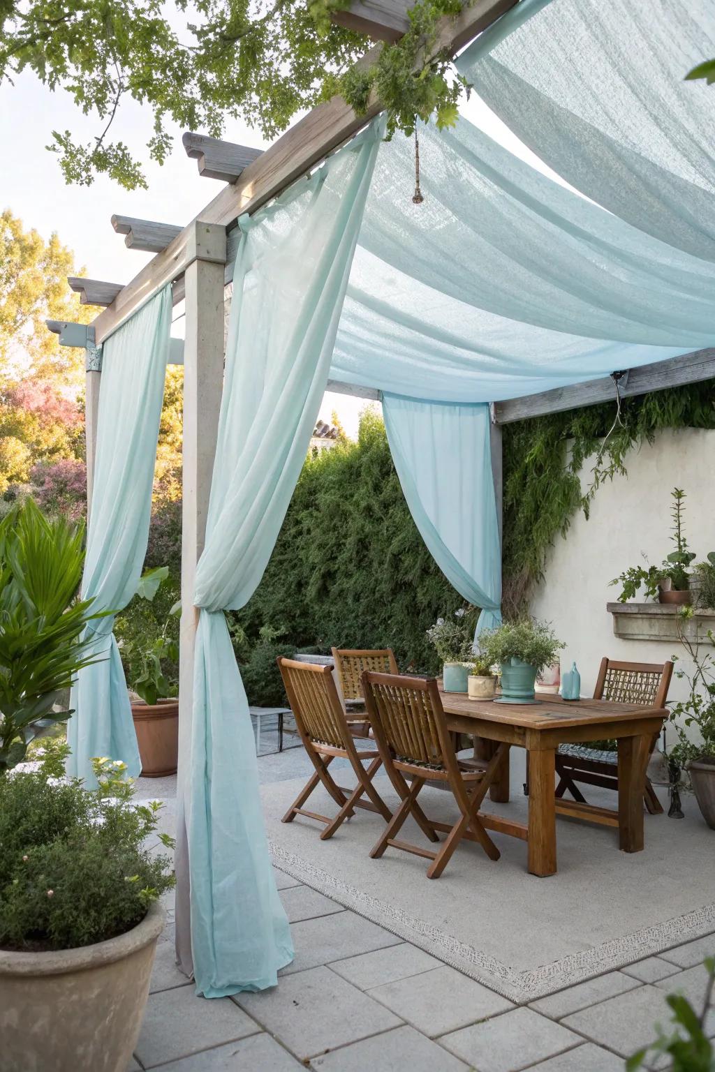 A homemade fabric canopy providing shade on a patio.