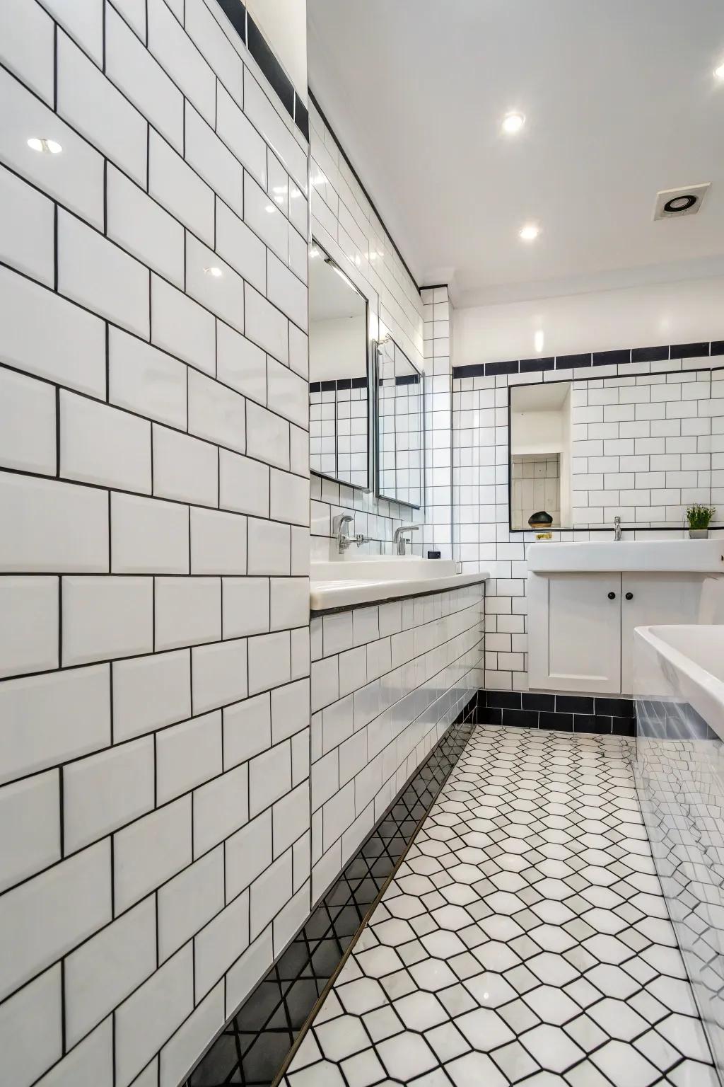 Bold grout contributes contrast and distinctiveness to white tiles.