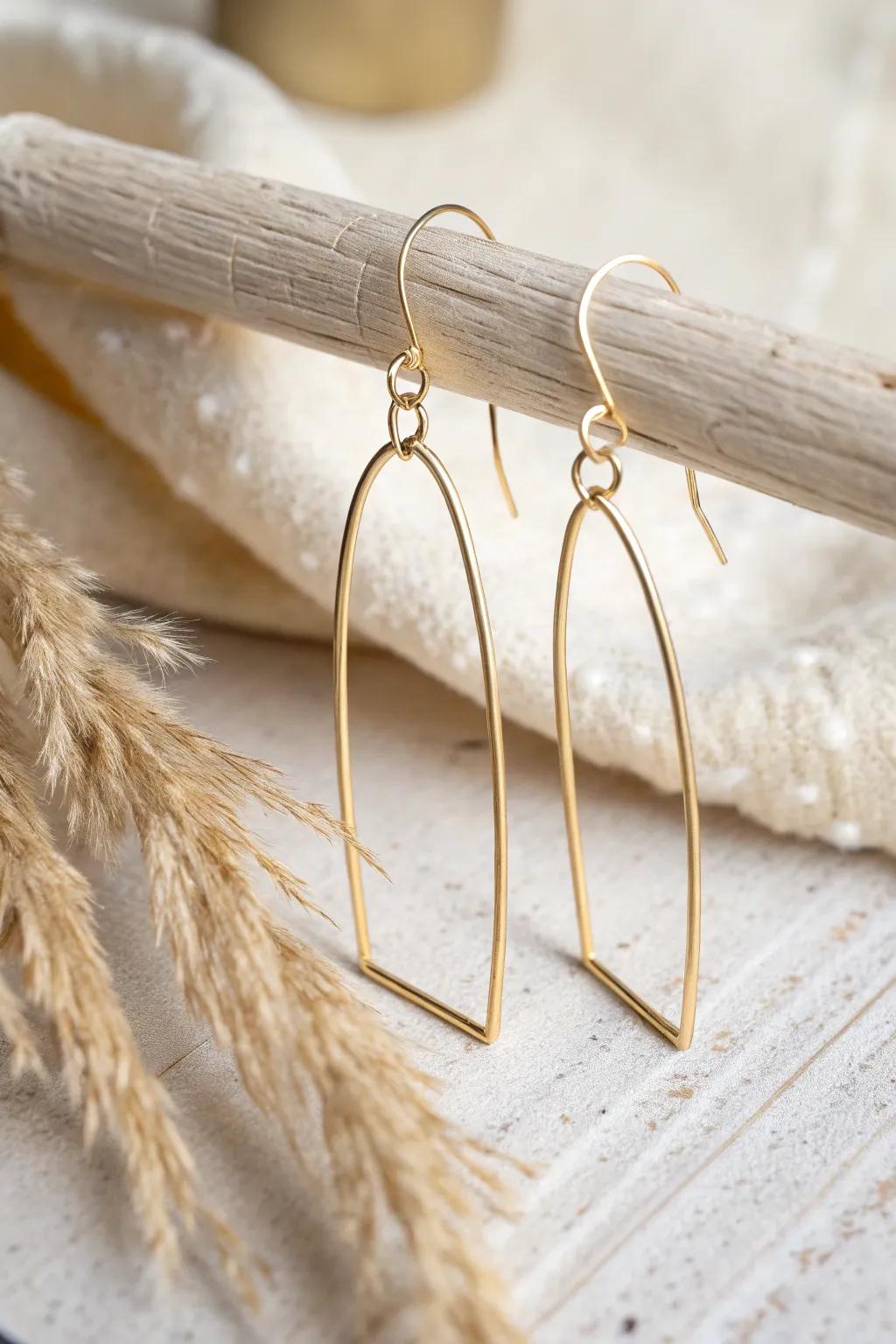 Embrace minimalist elegance with these sleek wire stick earrings &ndash; a supreme blend of simplicity and style.