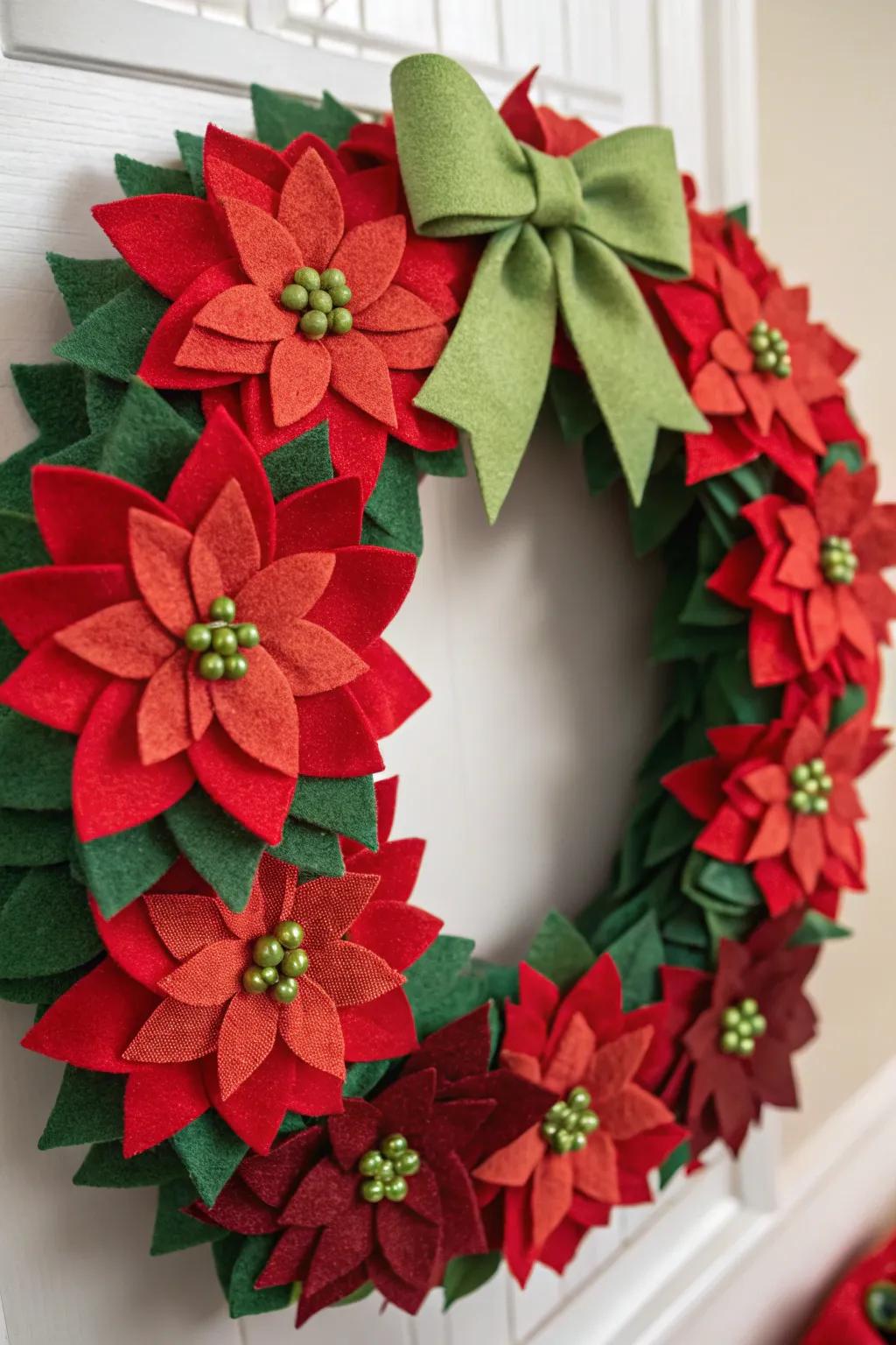 A radiant and festive felt poinsettia wreath perfect for the holiday period.