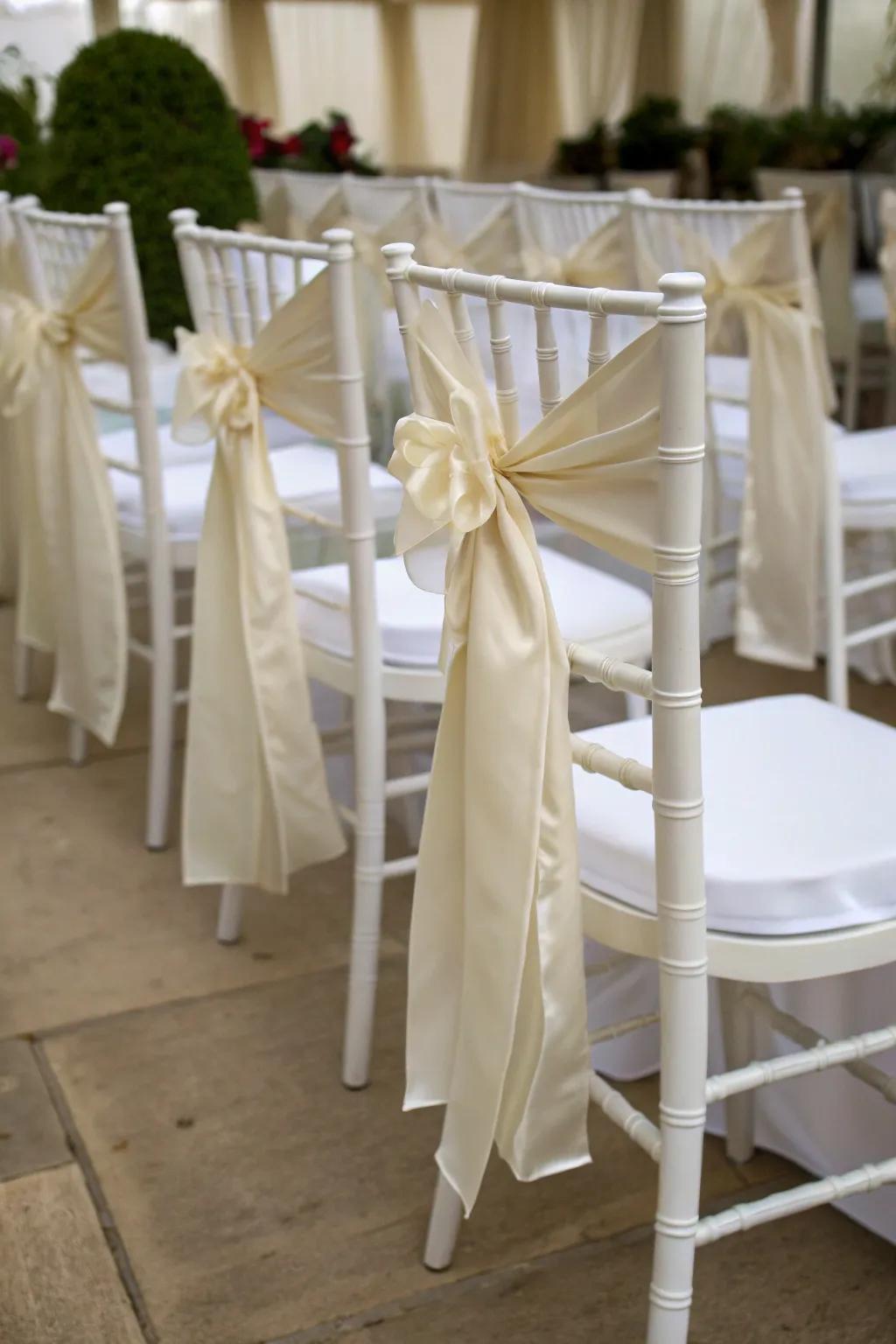 Silken bands give chairs a sentimental touch.