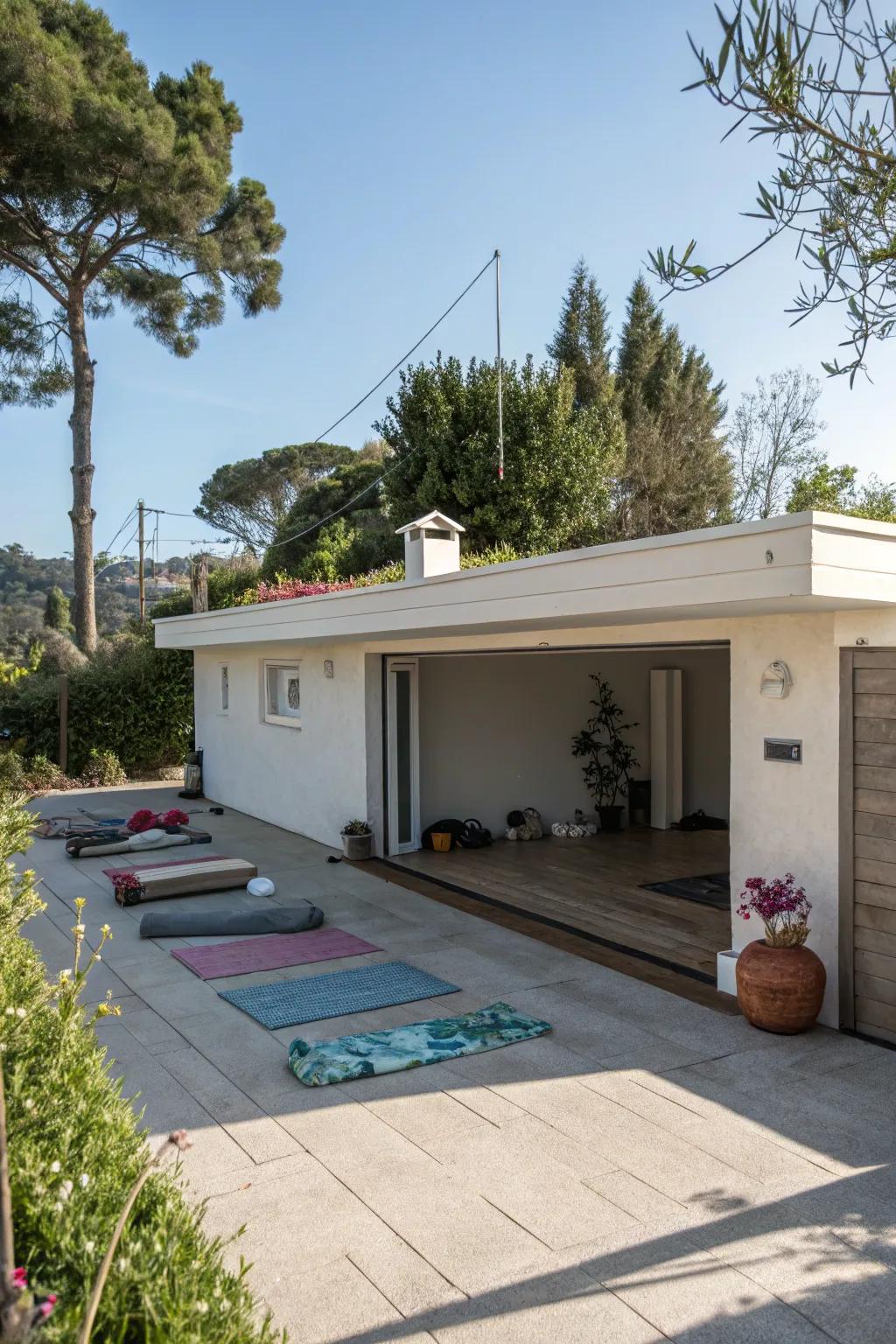 A rooftop yoga deck on a flat roof garage offers a tranquil escape.