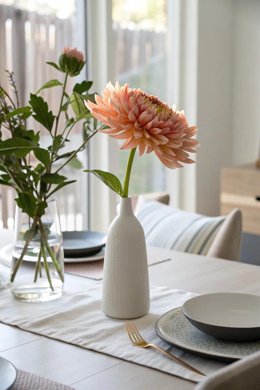 A minimalist centerpiece presenting a single flower.