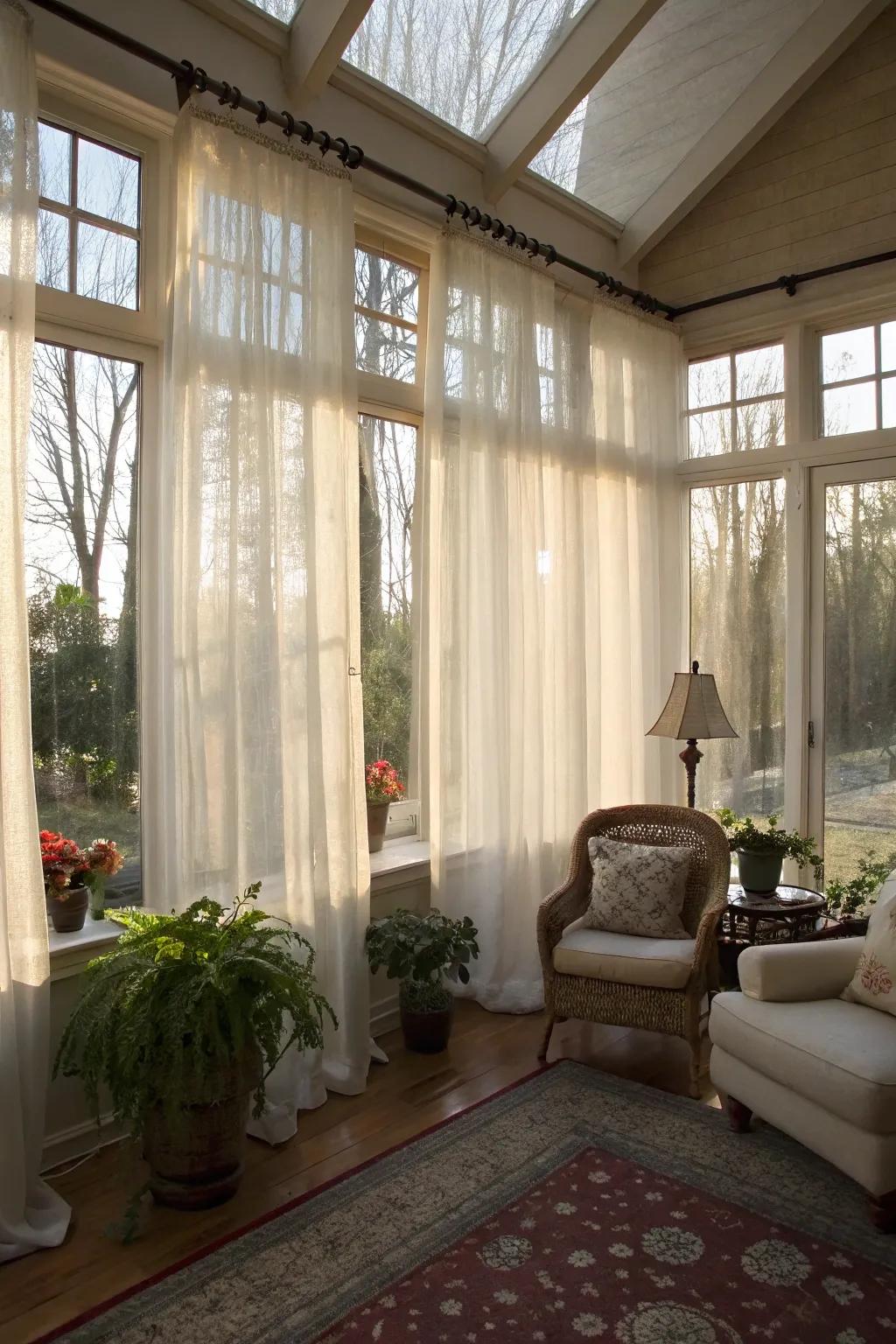 Light-filtering drapes enhance the natural glow in this welcoming sunroom.