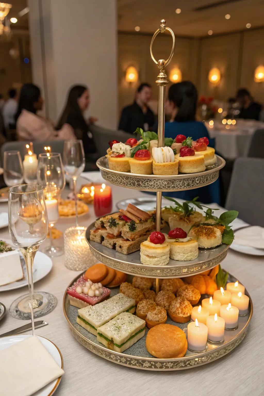 A dining surface primed for celebrations, exhibiting a tiered tray laden with comestibles.