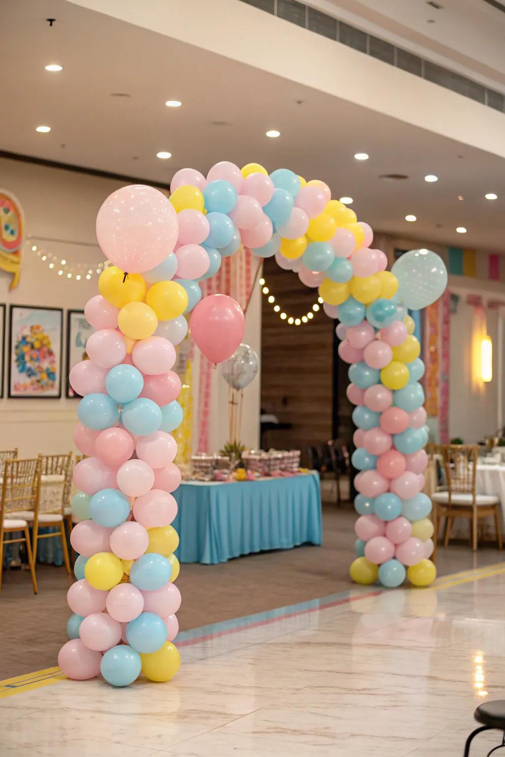 A fun pastel balloon arch perfect for a playful atmosphere.