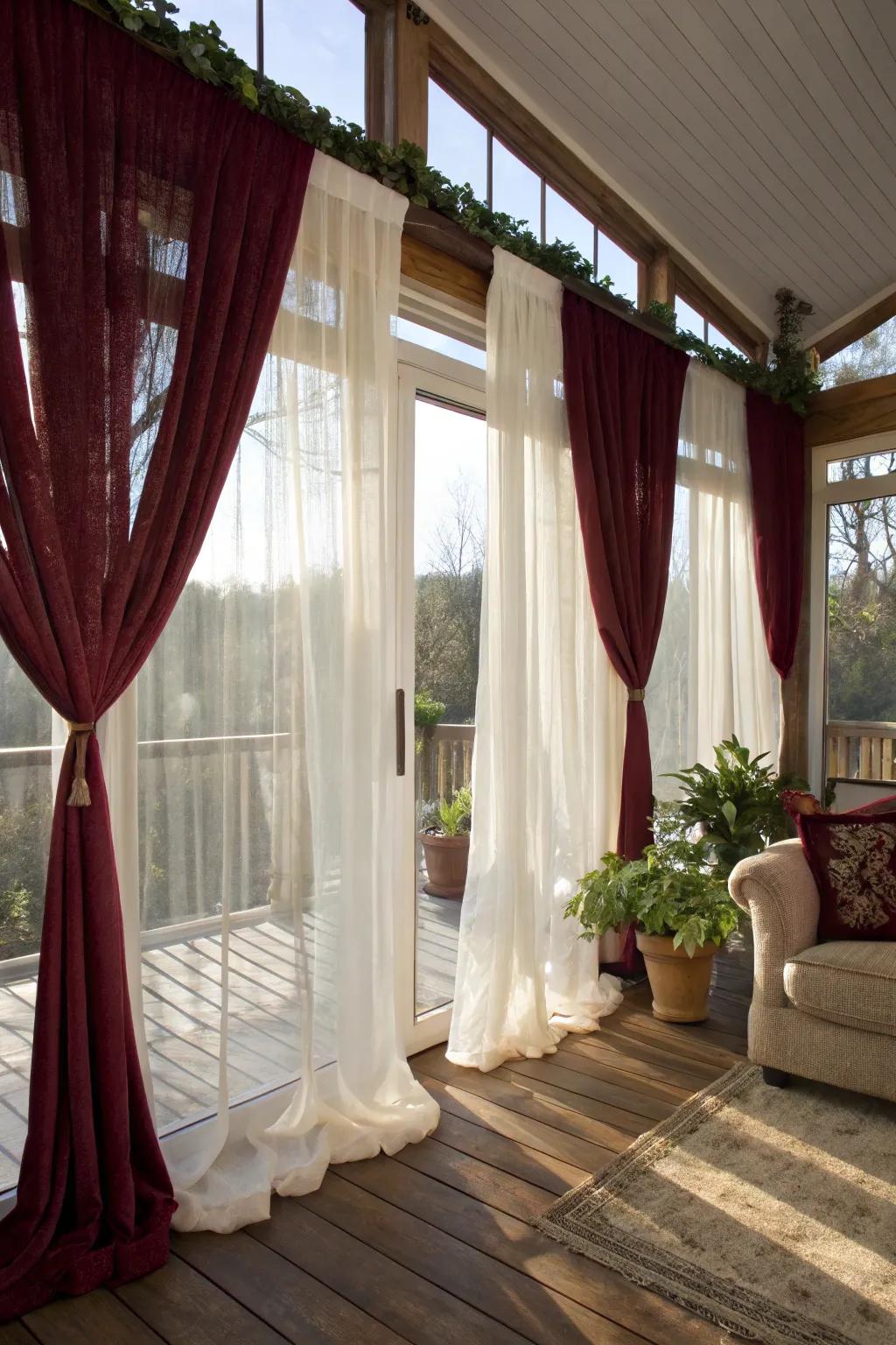 Layered textures in curtains create an inviting and rich sunroom atmosphere.