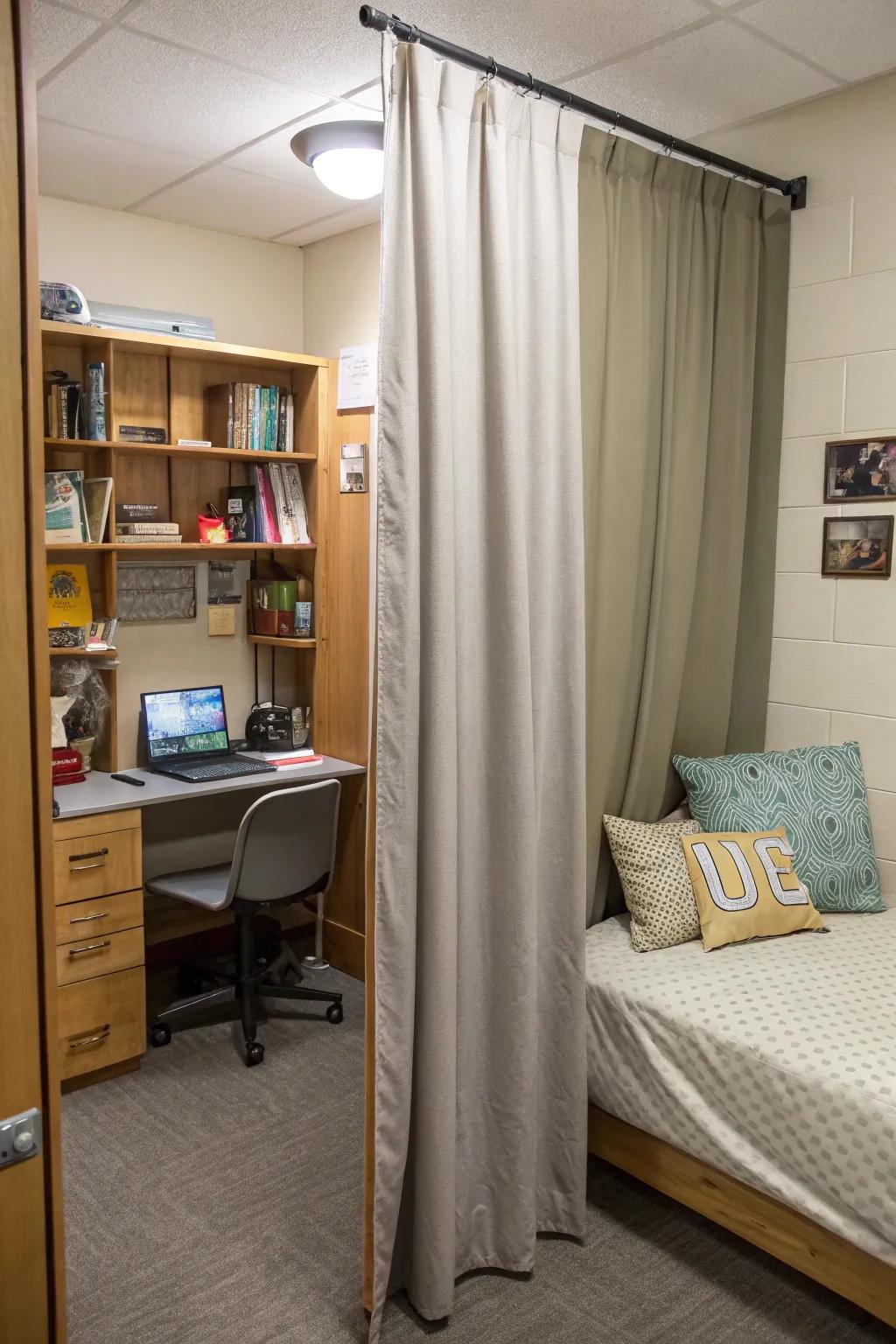 A drape divider creates separate areas in the dorm room.