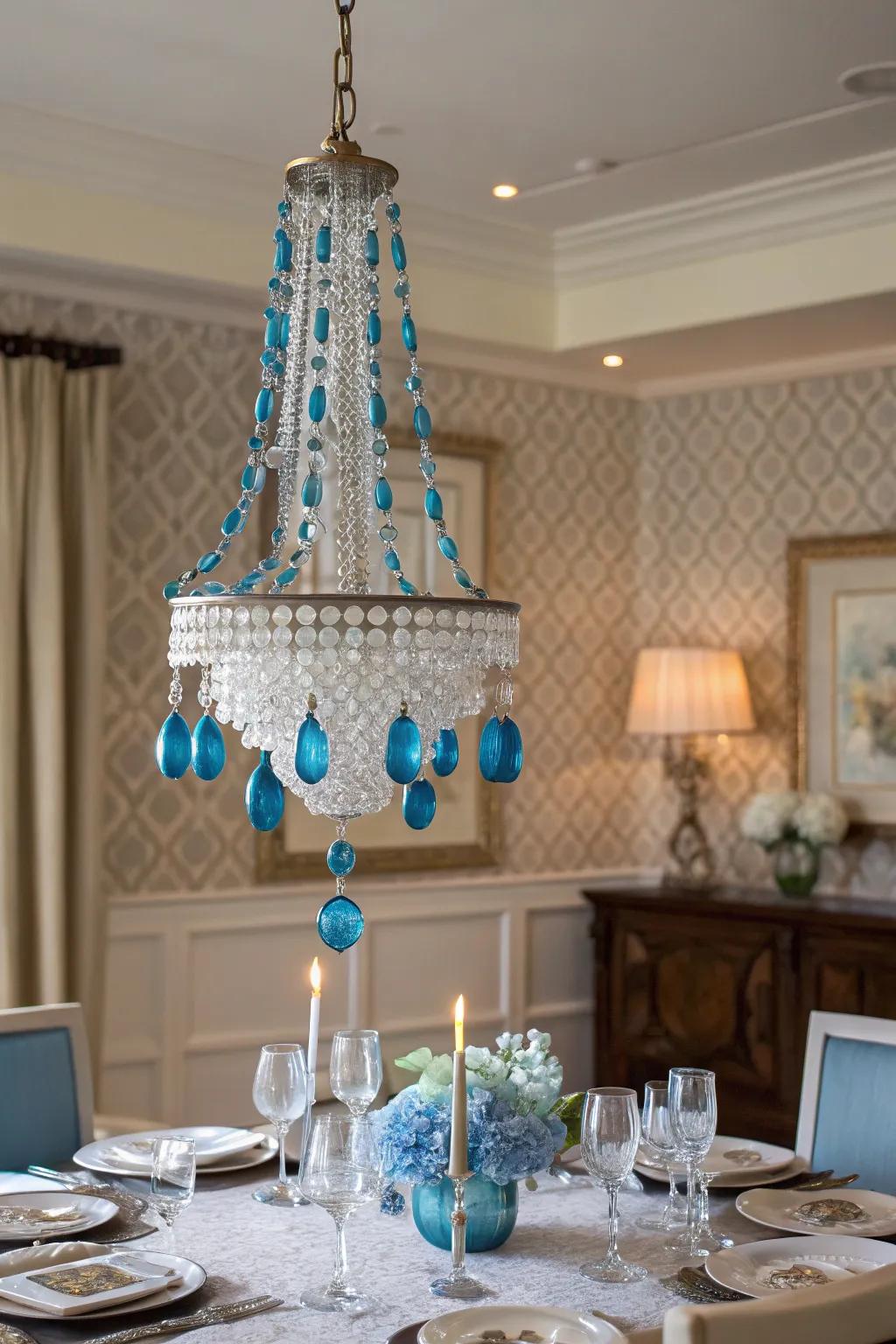 A blue ornament chandelier is a stunning holiday centerpiece.