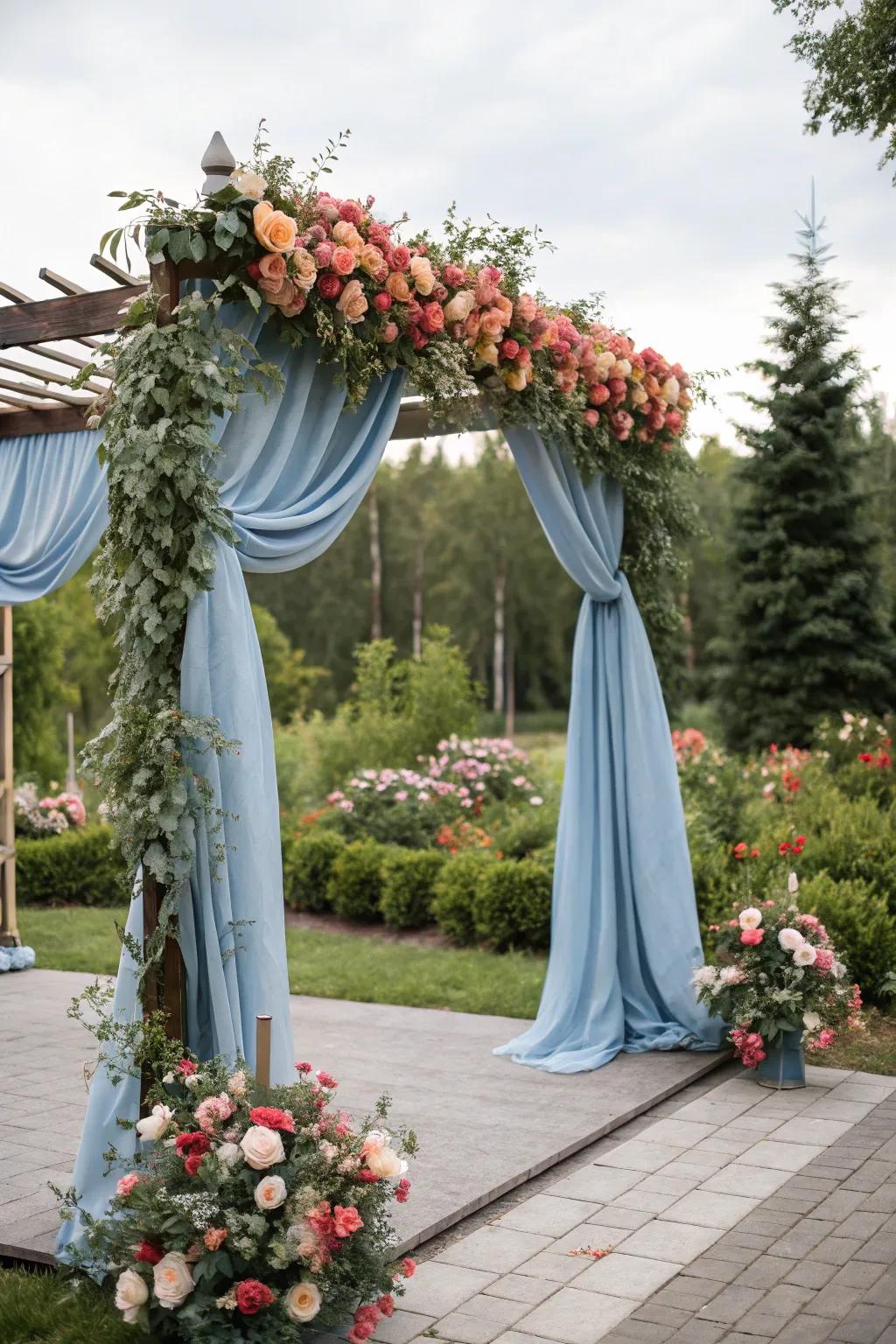 A stunning wedding archway with misty blue details, establishing a memorable ceremony backdrop.