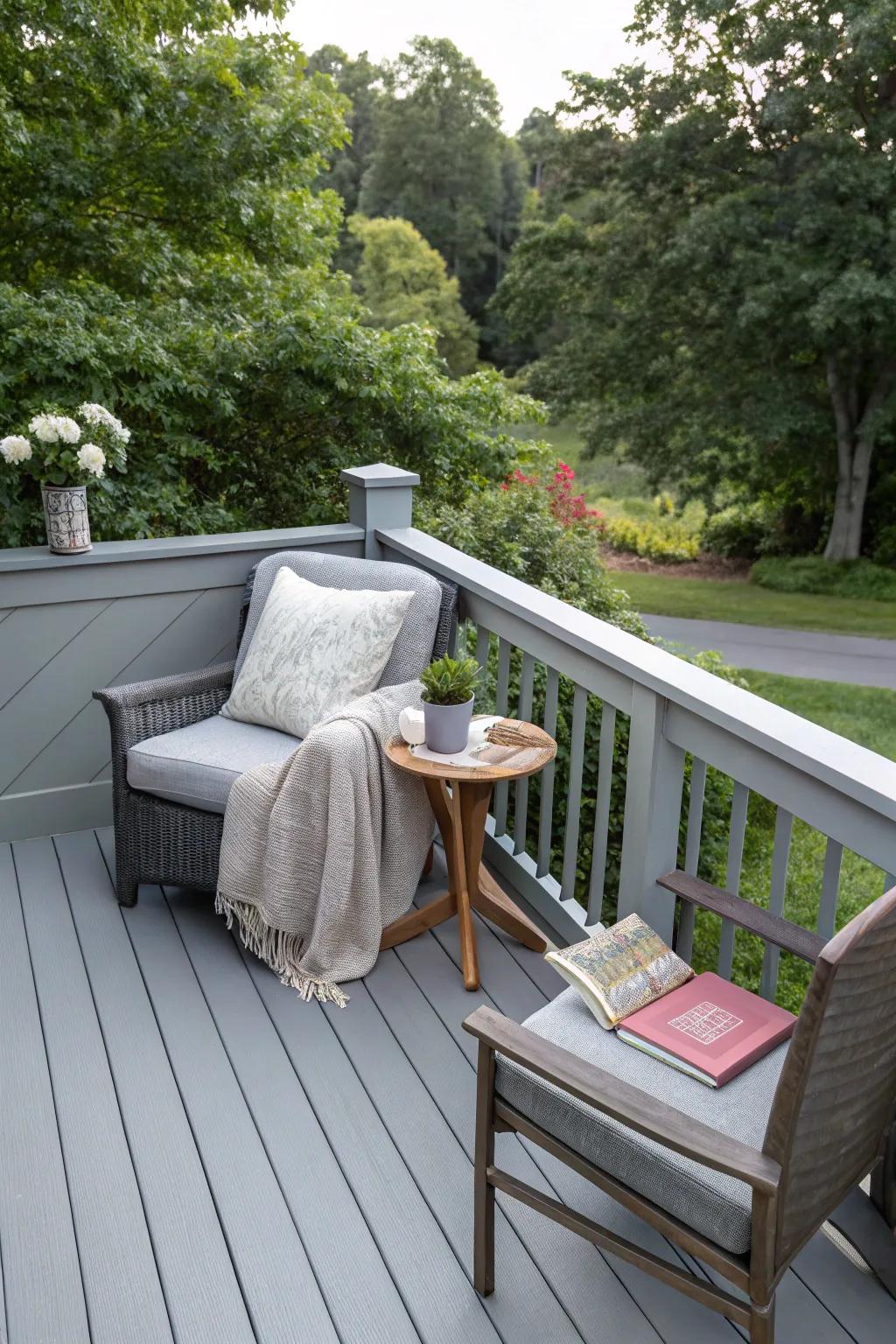 A personal reading corner on a tranquil grey deck.