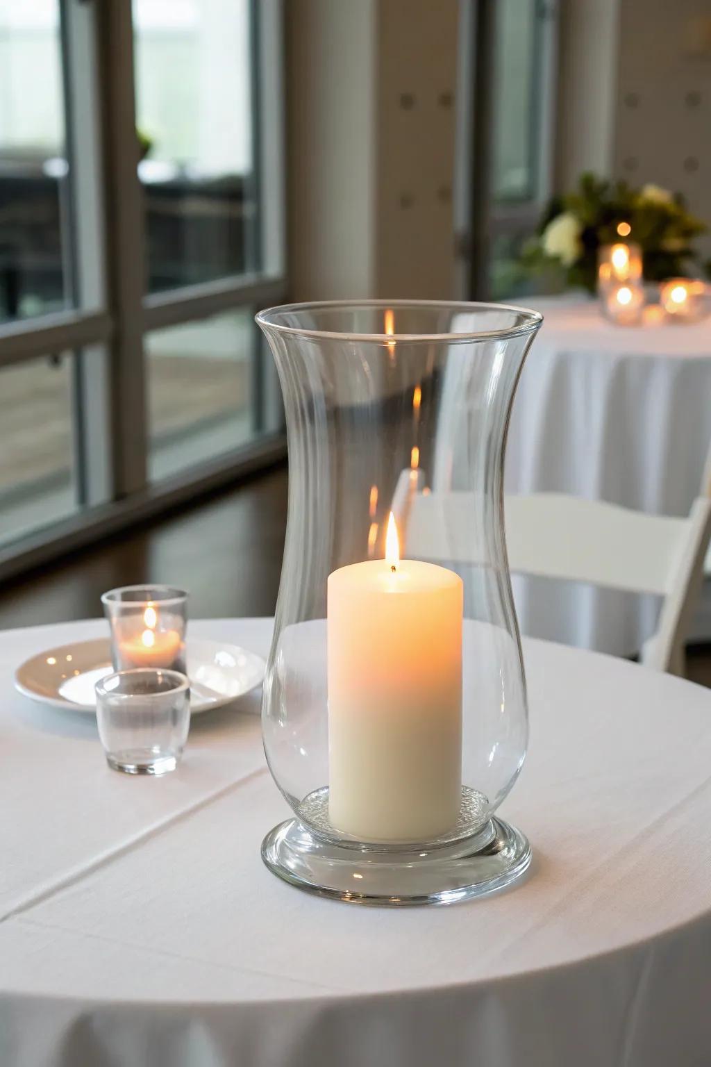 A single tall candle in a windproof candle holder for a minimalist and chic look.