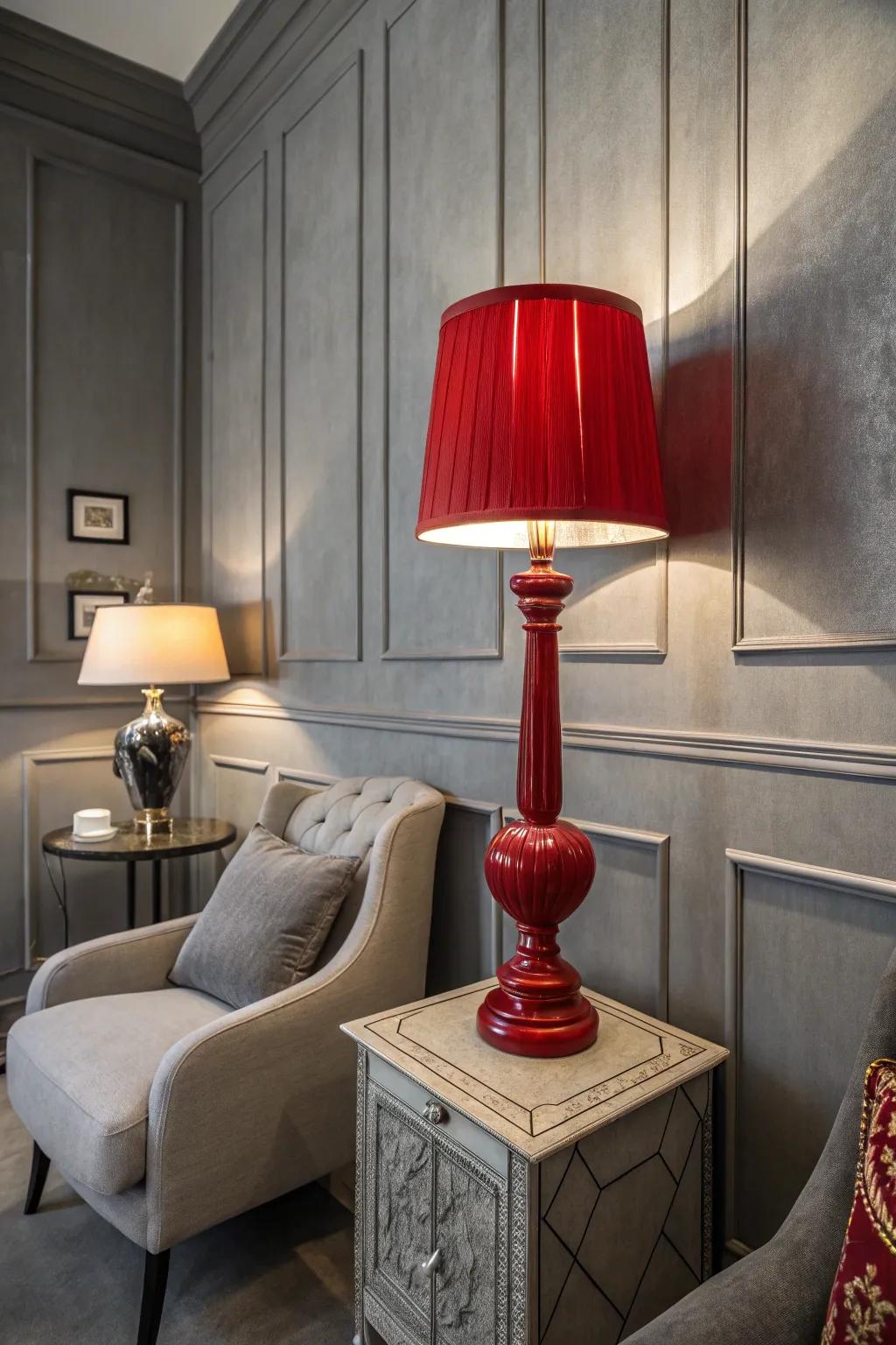 A rouge lamp sprinkles charm on a grey themed space.