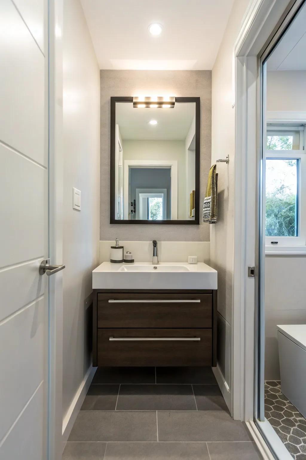 A wall-supported vanity that saves space and adds a modern touch to a compact bathroom.
