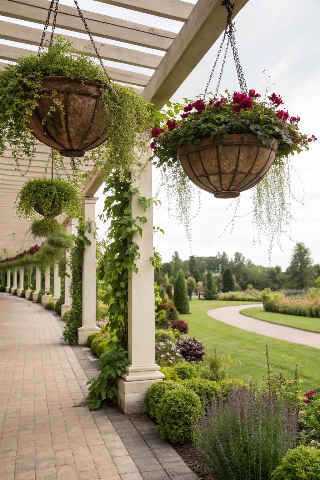 Suspended gardens introduce vertical verdure to the pergola.