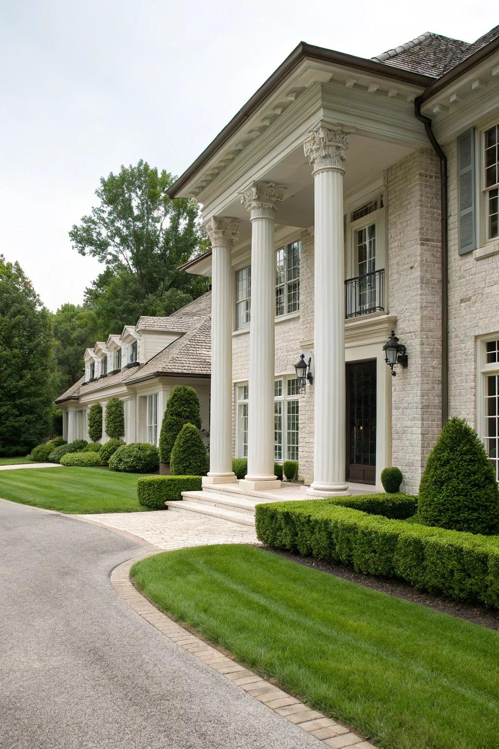 Ageless elegance with alabaster brick and pearl granite pillars.