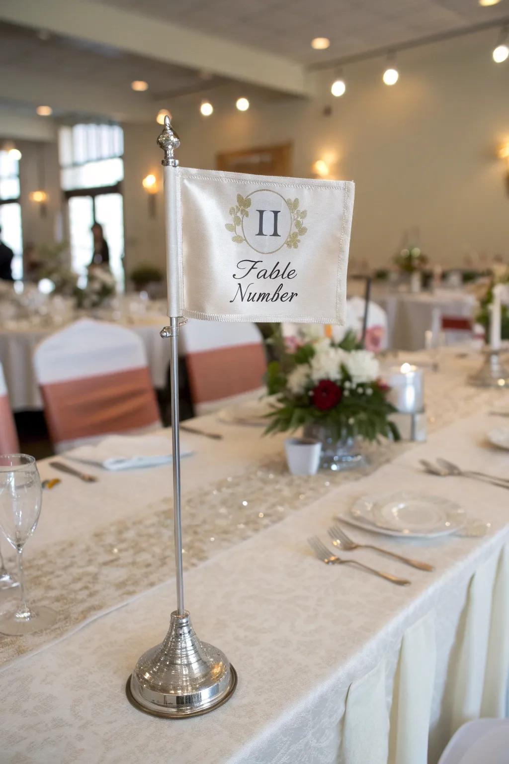 Banner and stand presentations contribute a whimsical element to your wedding tables.