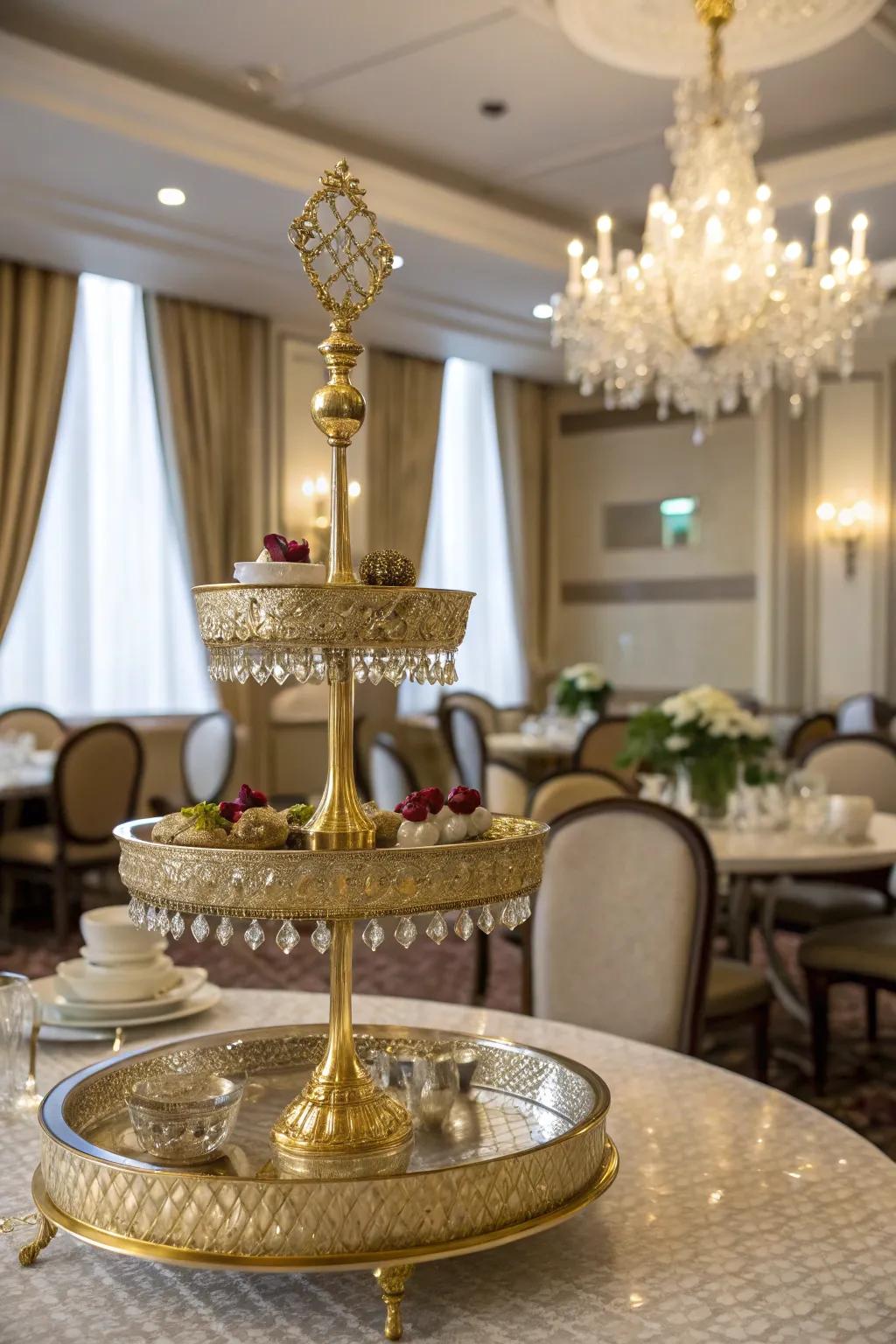 Glamorous gilded accents convey opulence to this tiered stand.
