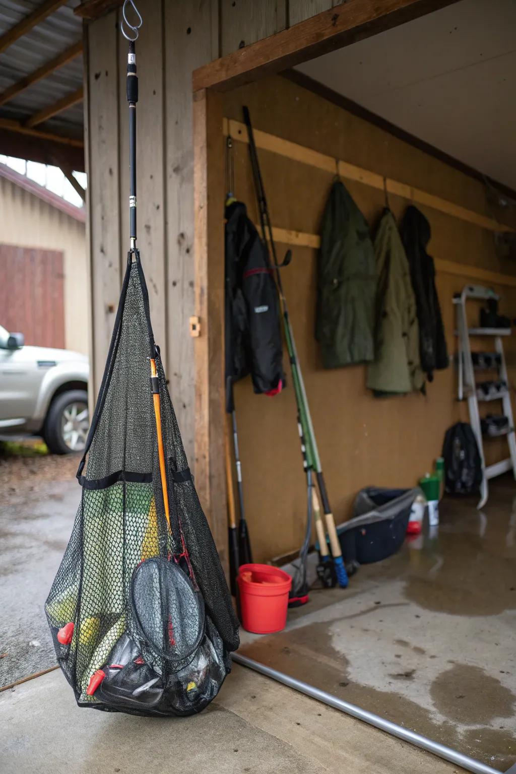 A mesh bag provides a breathable option for drying wet fishing gear in the garage.