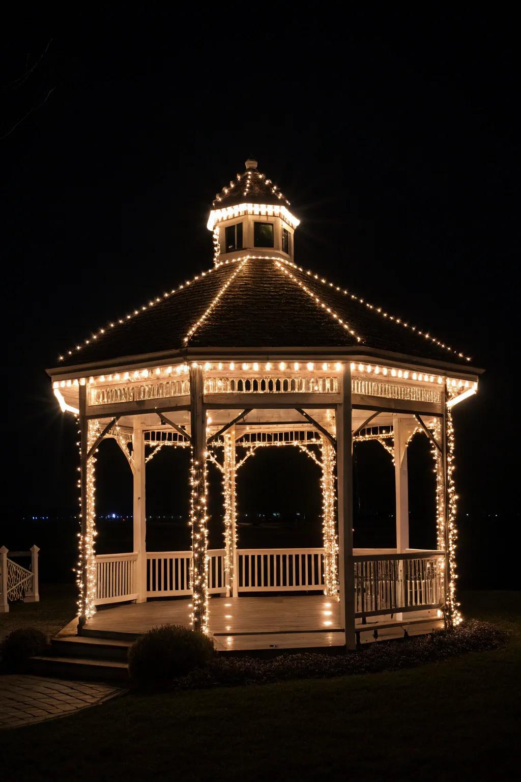 Cord illumination spotlighting the gazebo's structural configuration.